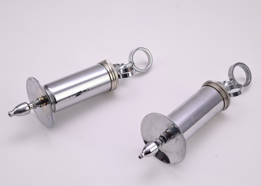 Pair of Antique Matchless Randall Faichney Co. Syringes