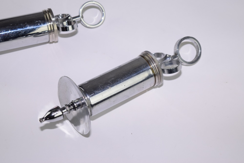 Pair of Antique Matchless Randall Faichney Co. Syringes