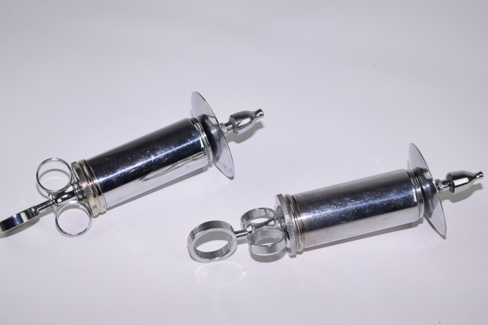 Pair of Antique Matchless Randall Faichney Co. Syringes