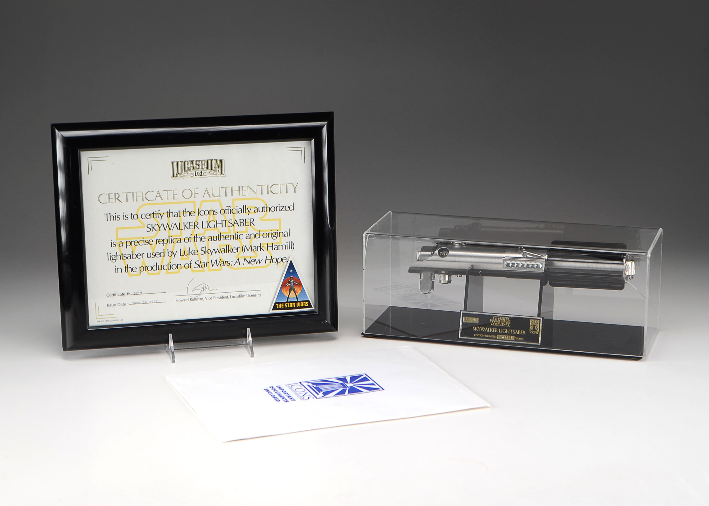 Authentic Replica "Skywalker Lightsaber" in Display Case