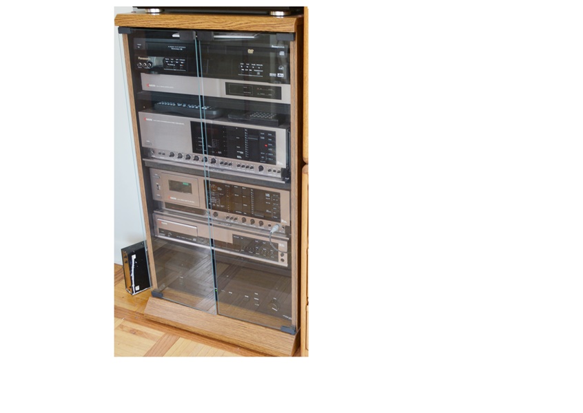 Kyocera Stereo System, Panasonic VHS/DVD and Laminate Cabinet