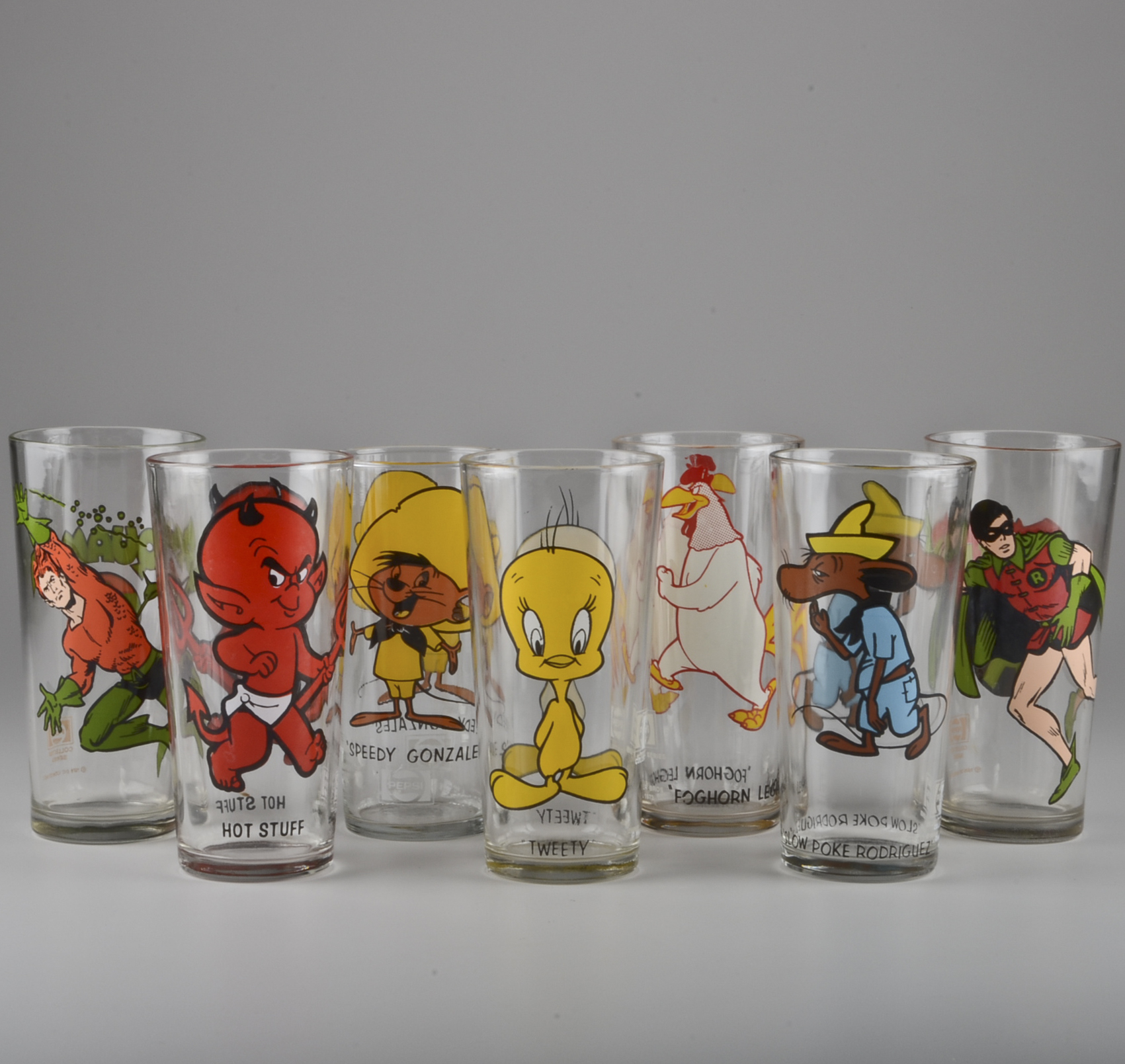 Seven Collectible Pepsi Glasses with Cartoon Characters