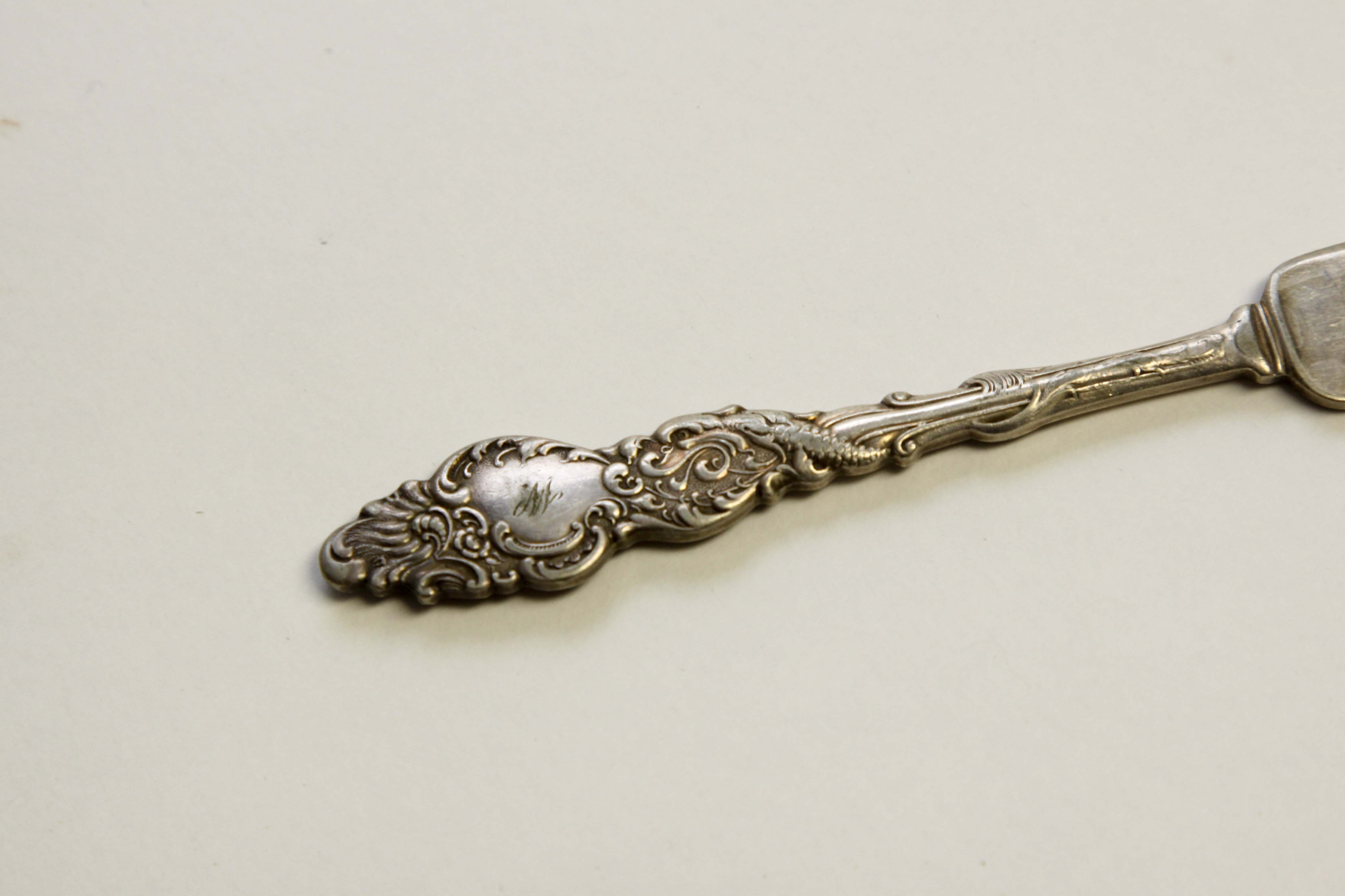 Sterling Silver Pearl Handle Serving Spoon and Silverplate Group