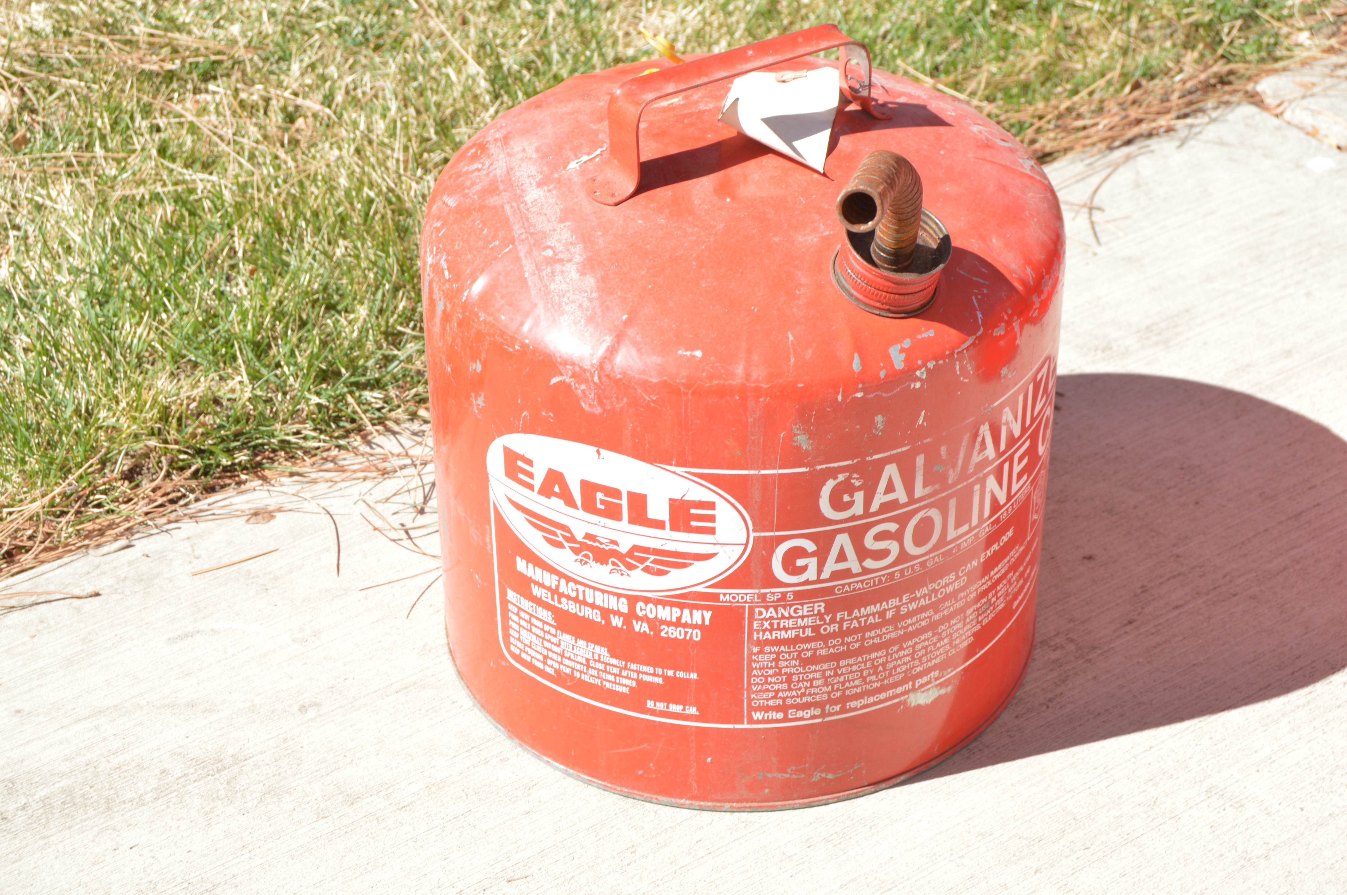 Troy Bilt Lawn Mower and Gas Cans