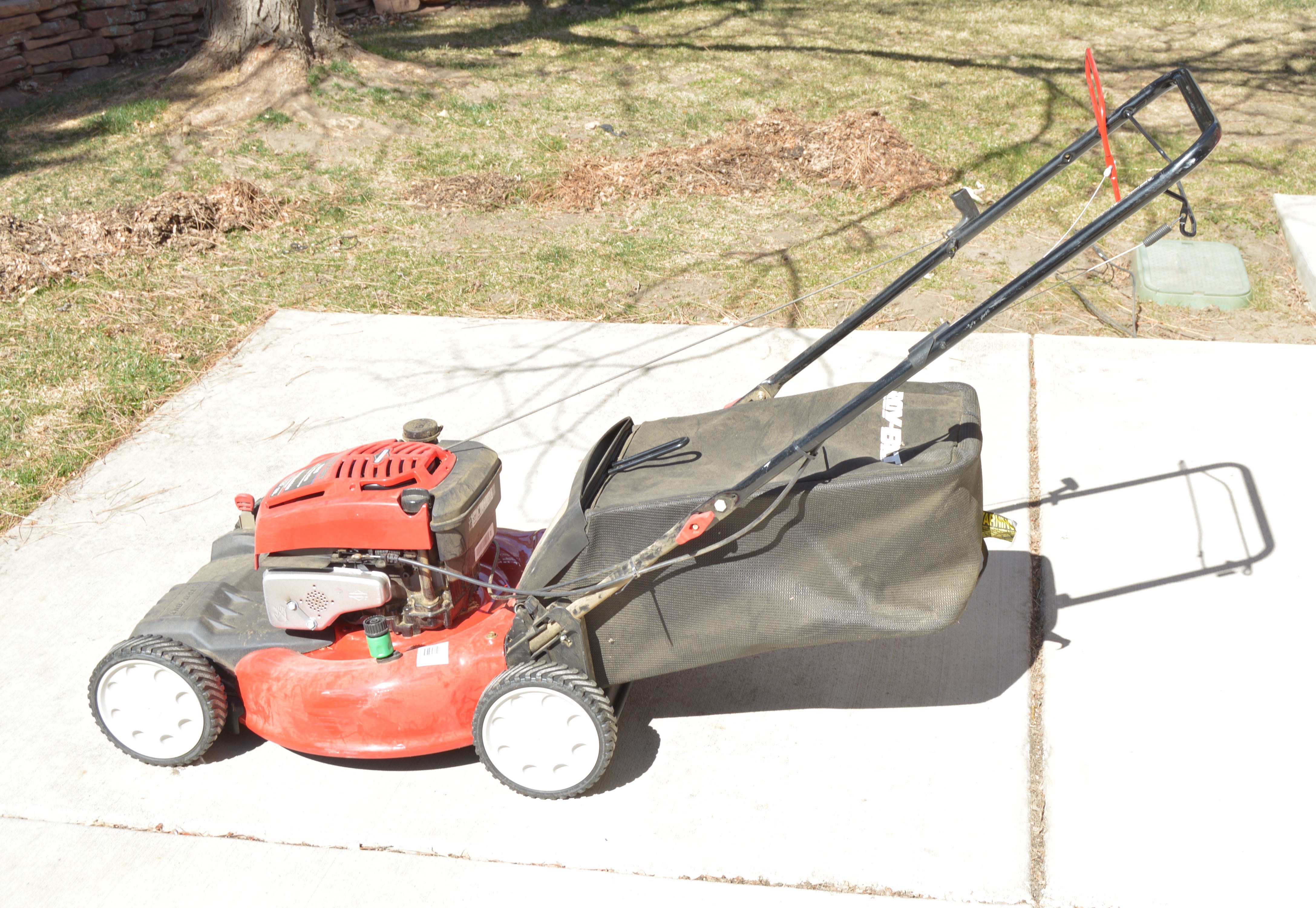 Troy Bilt Lawn Mower and Gas Cans