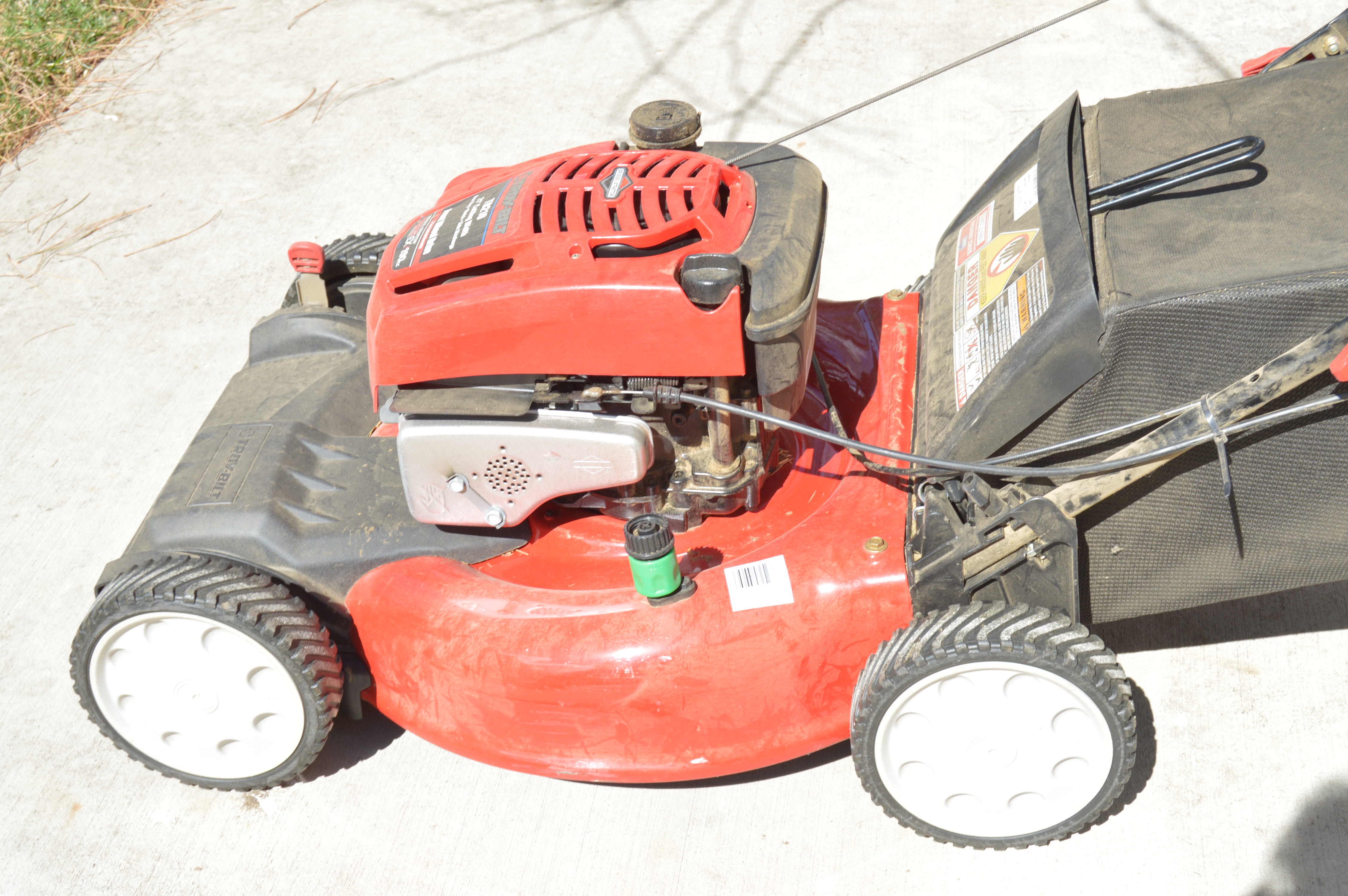 Troy Bilt Lawn Mower and Gas Cans