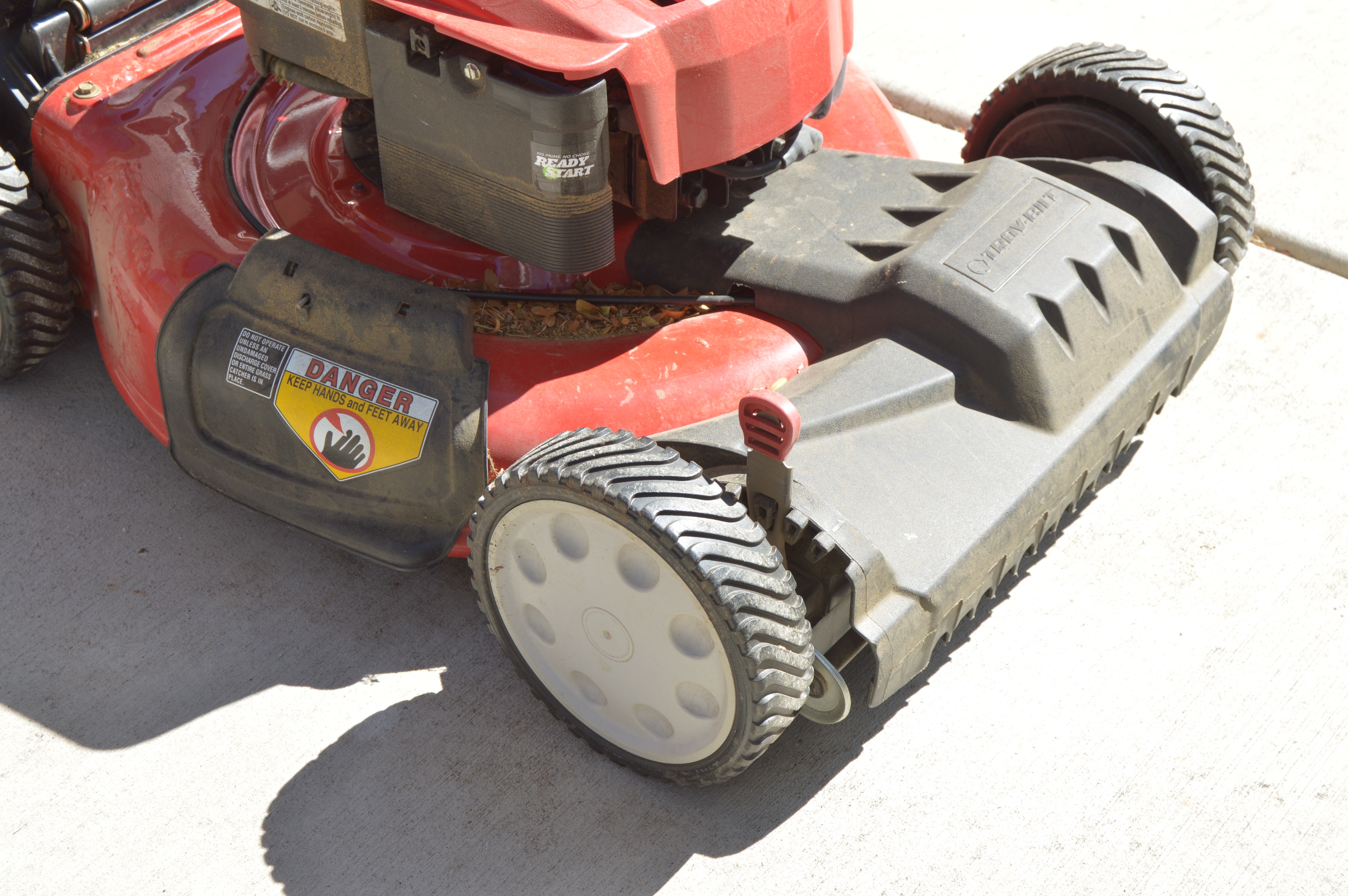 Troy Bilt Lawn Mower and Gas Cans