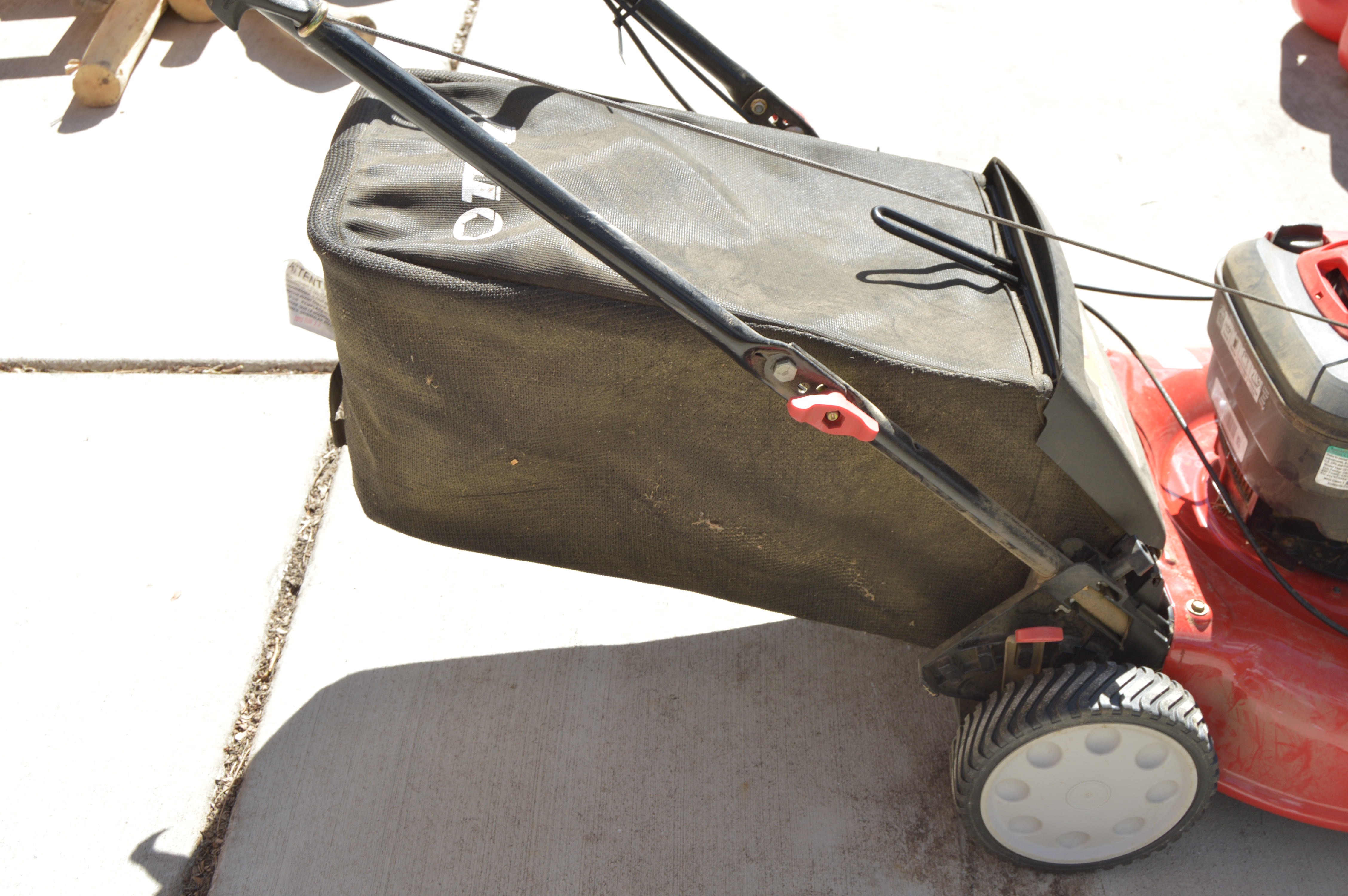 Troy Bilt Lawn Mower and Gas Cans