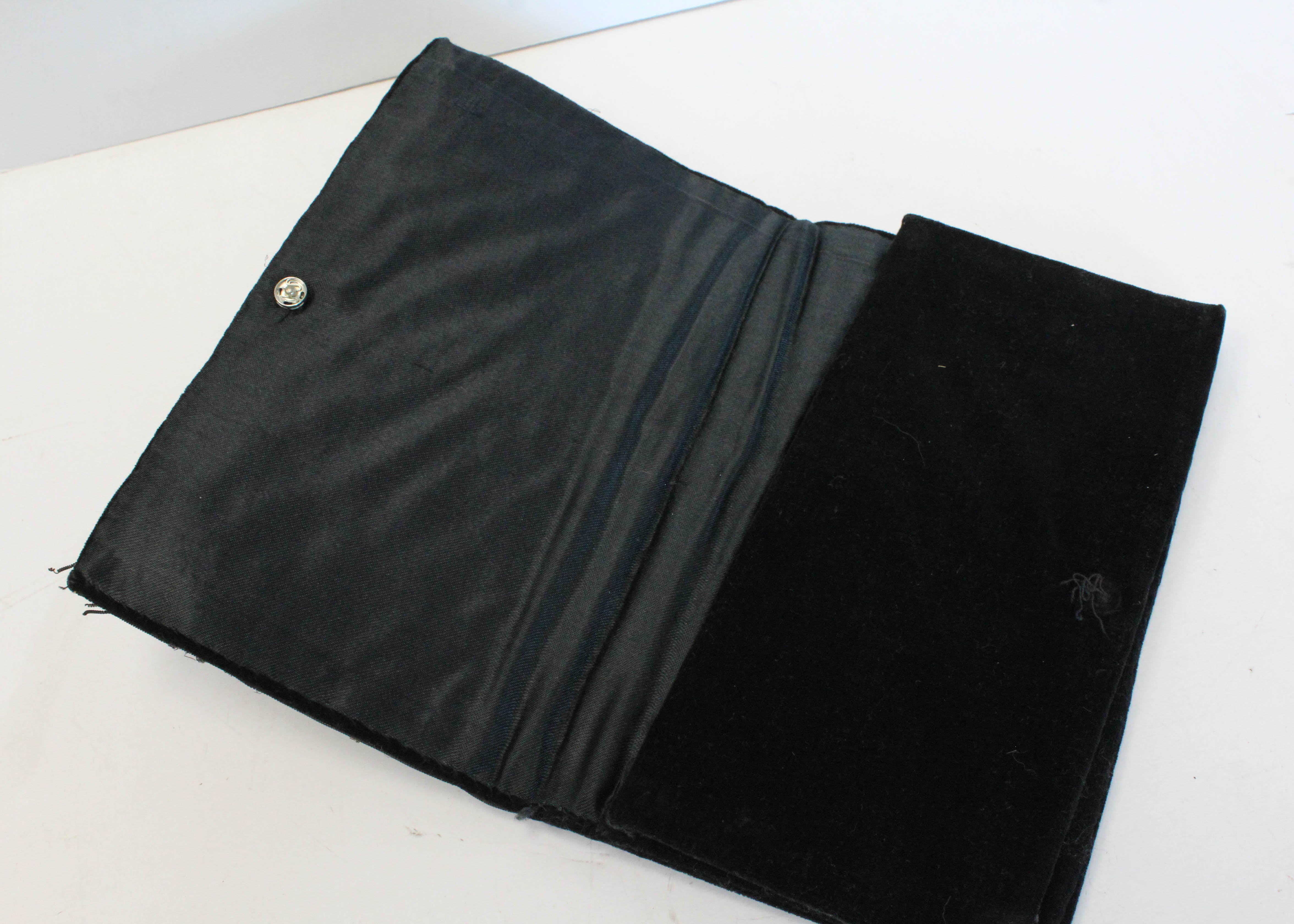 Pair of Embroidered Pocket Books