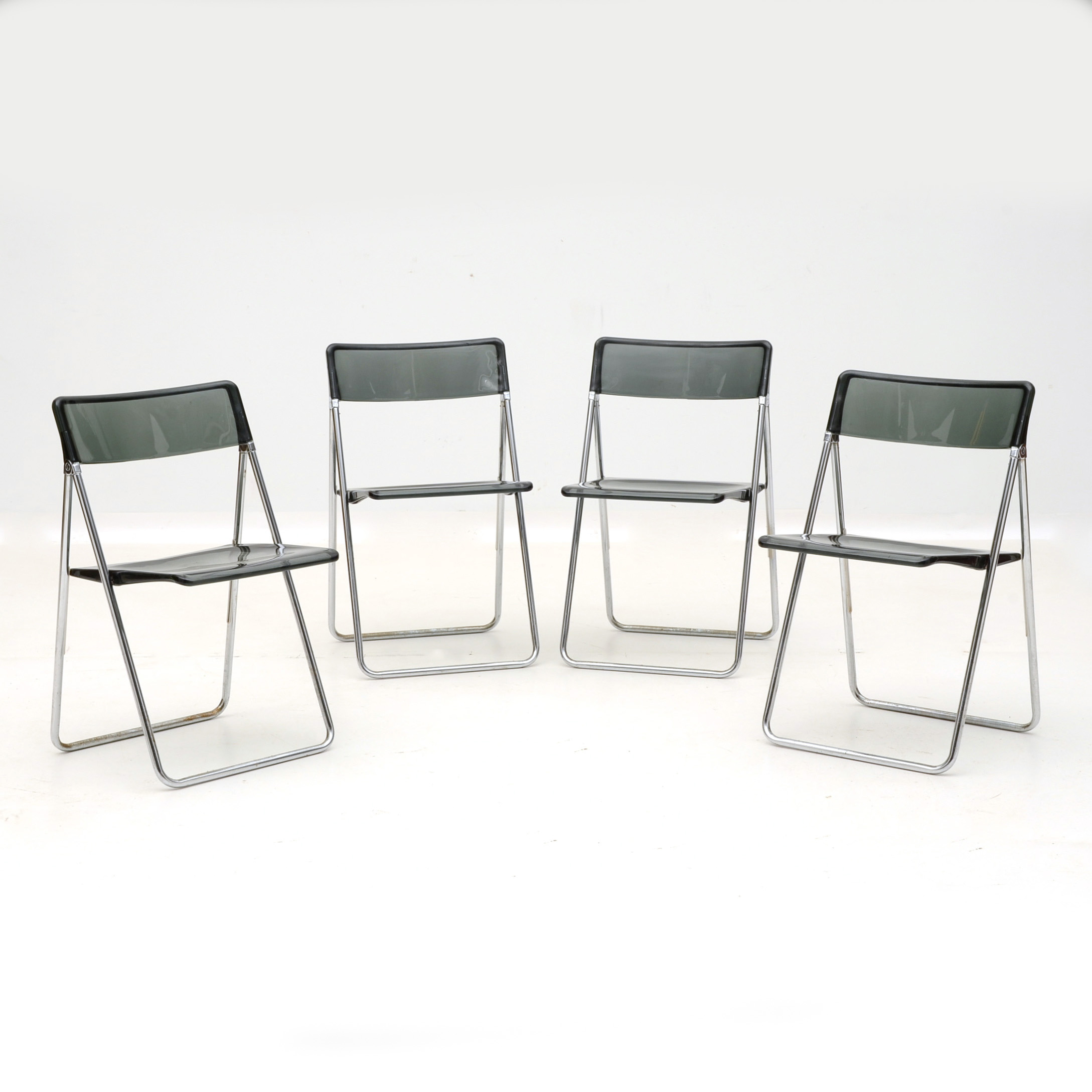 Set of Four Black Acrylic Folding Chairs