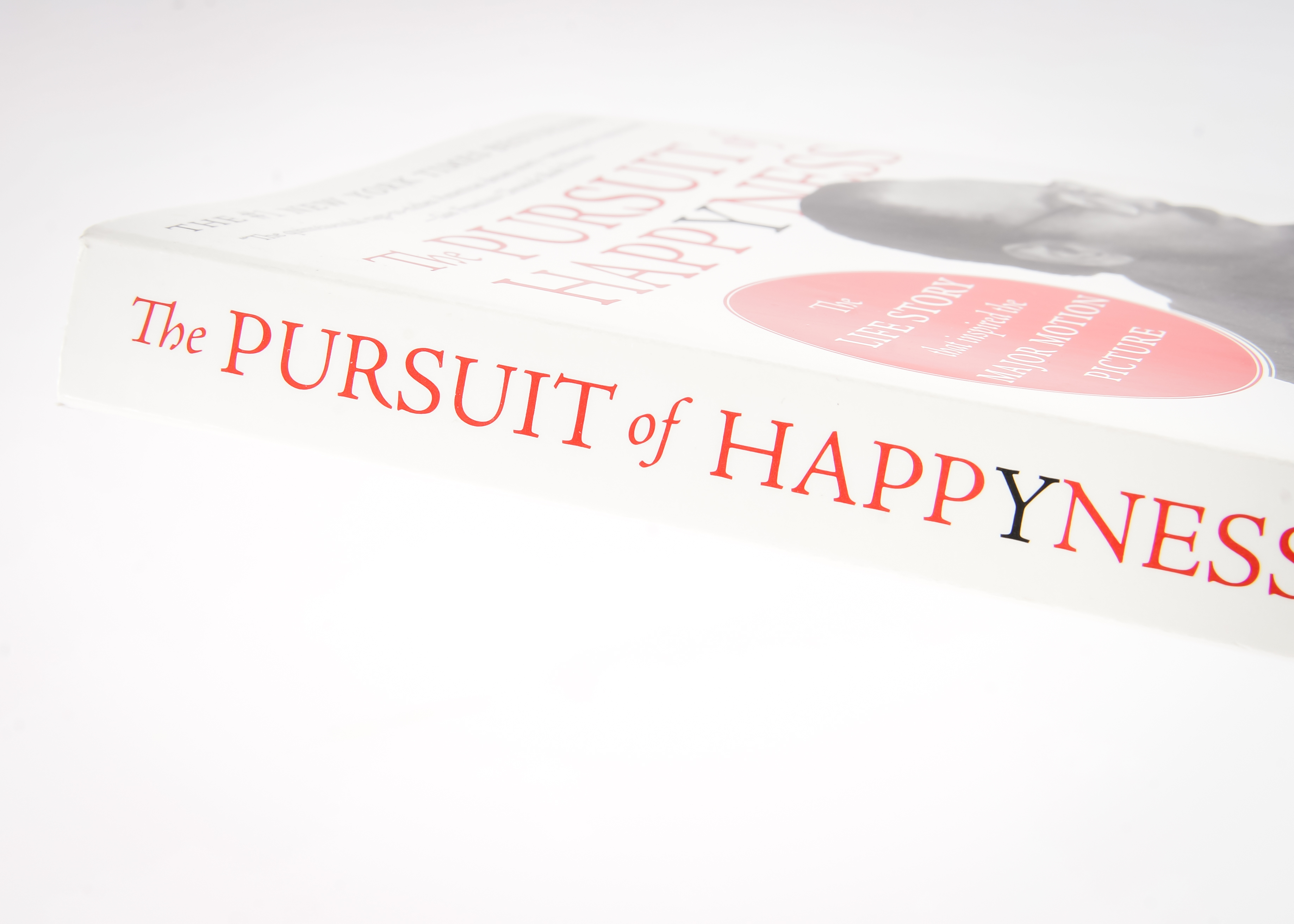 Signed Trade Paperback of "The Pursuit of Happyness" with Rubik's Cube