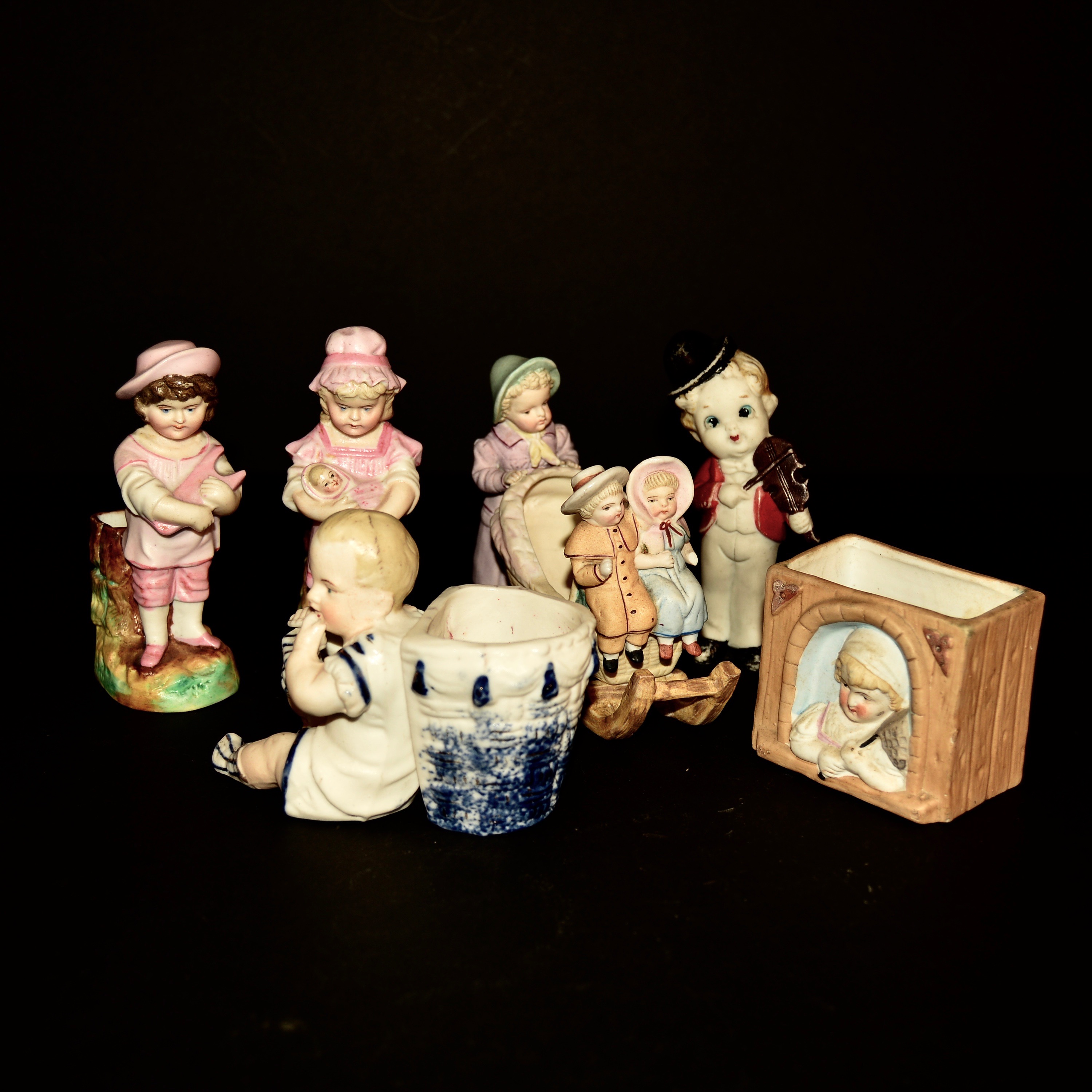 Group of Antique and Vintage Painted Bisque Figurines