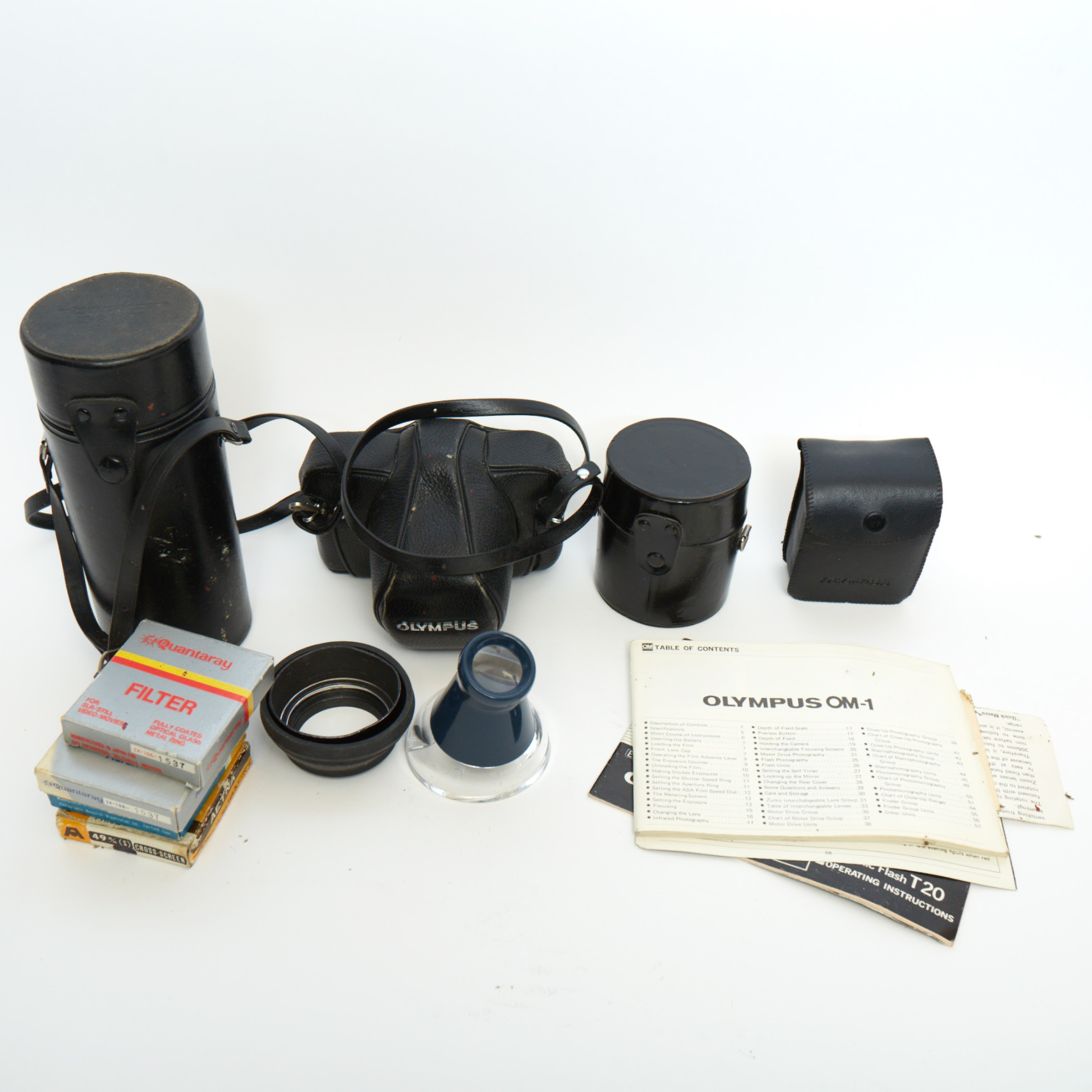 Vintage Olympus OM-1 SLR Camera with Three Lenses