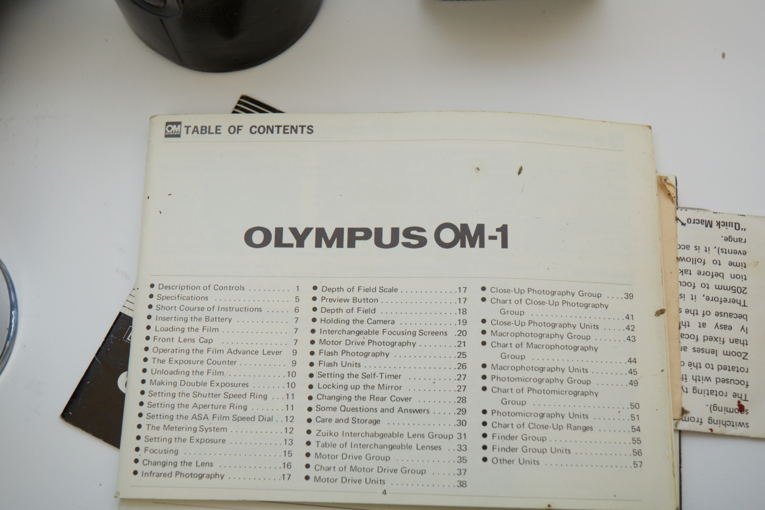 Vintage Olympus OM-1 SLR Camera with Three Lenses