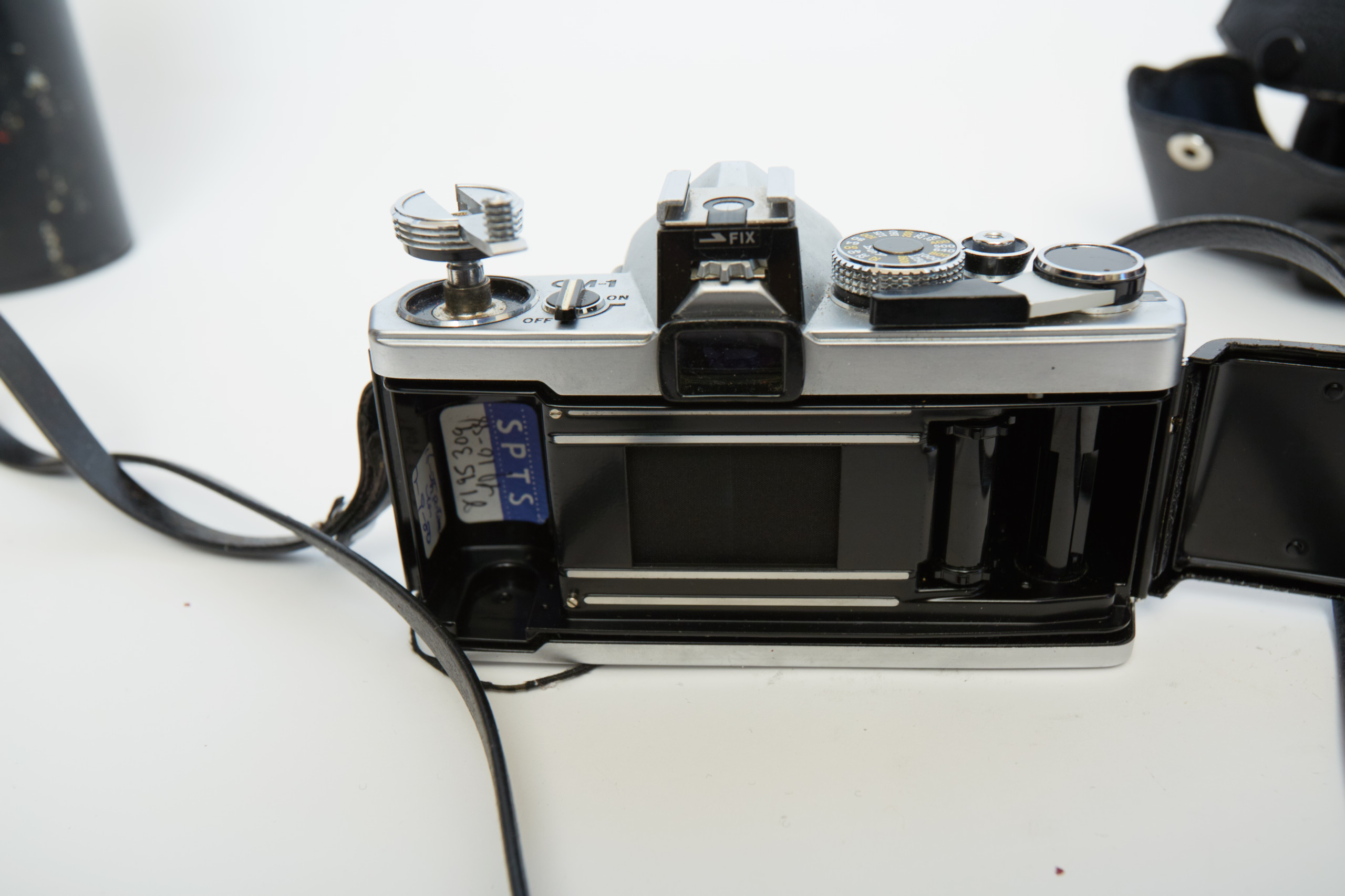 Vintage Olympus OM-1 SLR Camera with Three Lenses