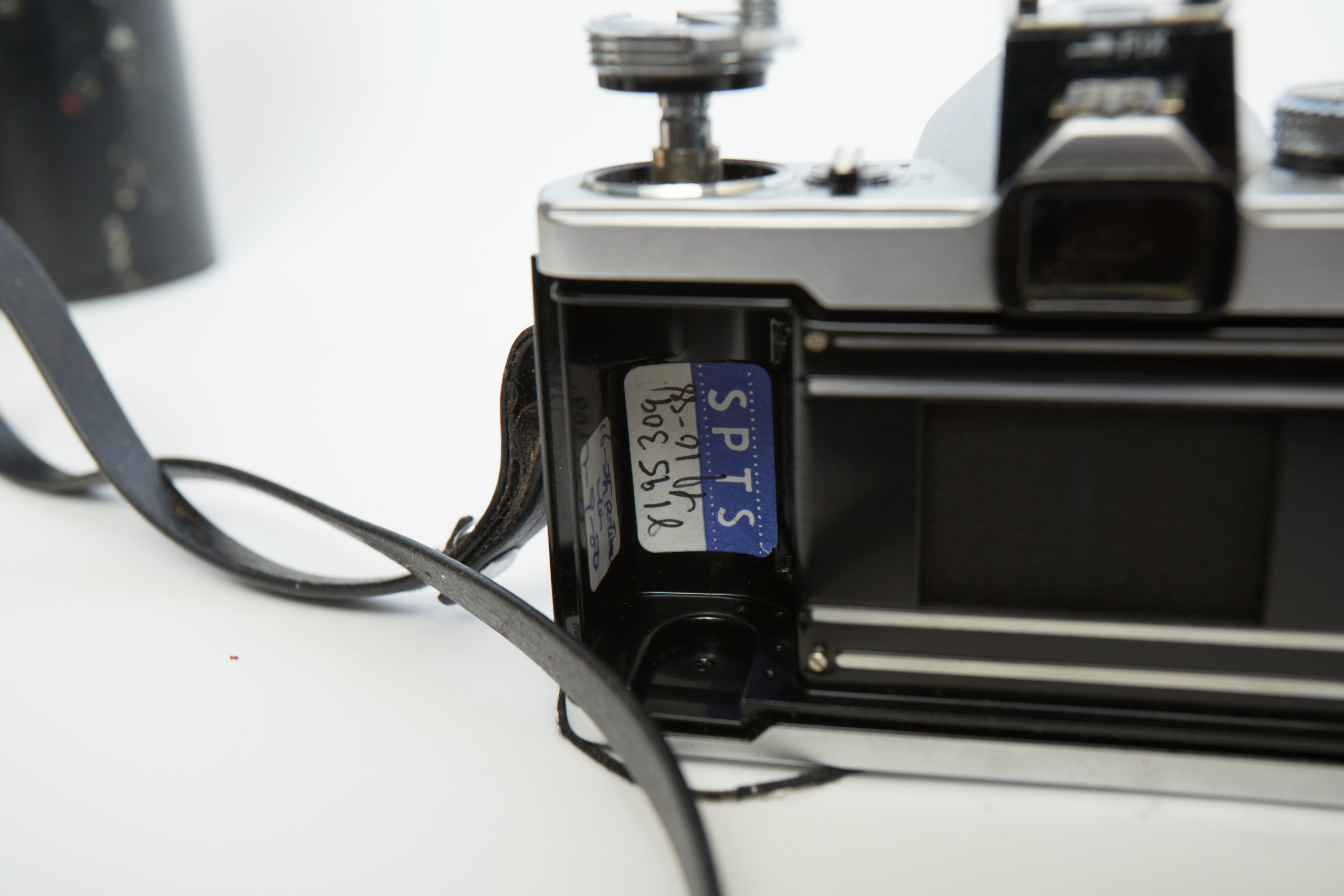 Vintage Olympus OM-1 SLR Camera with Three Lenses