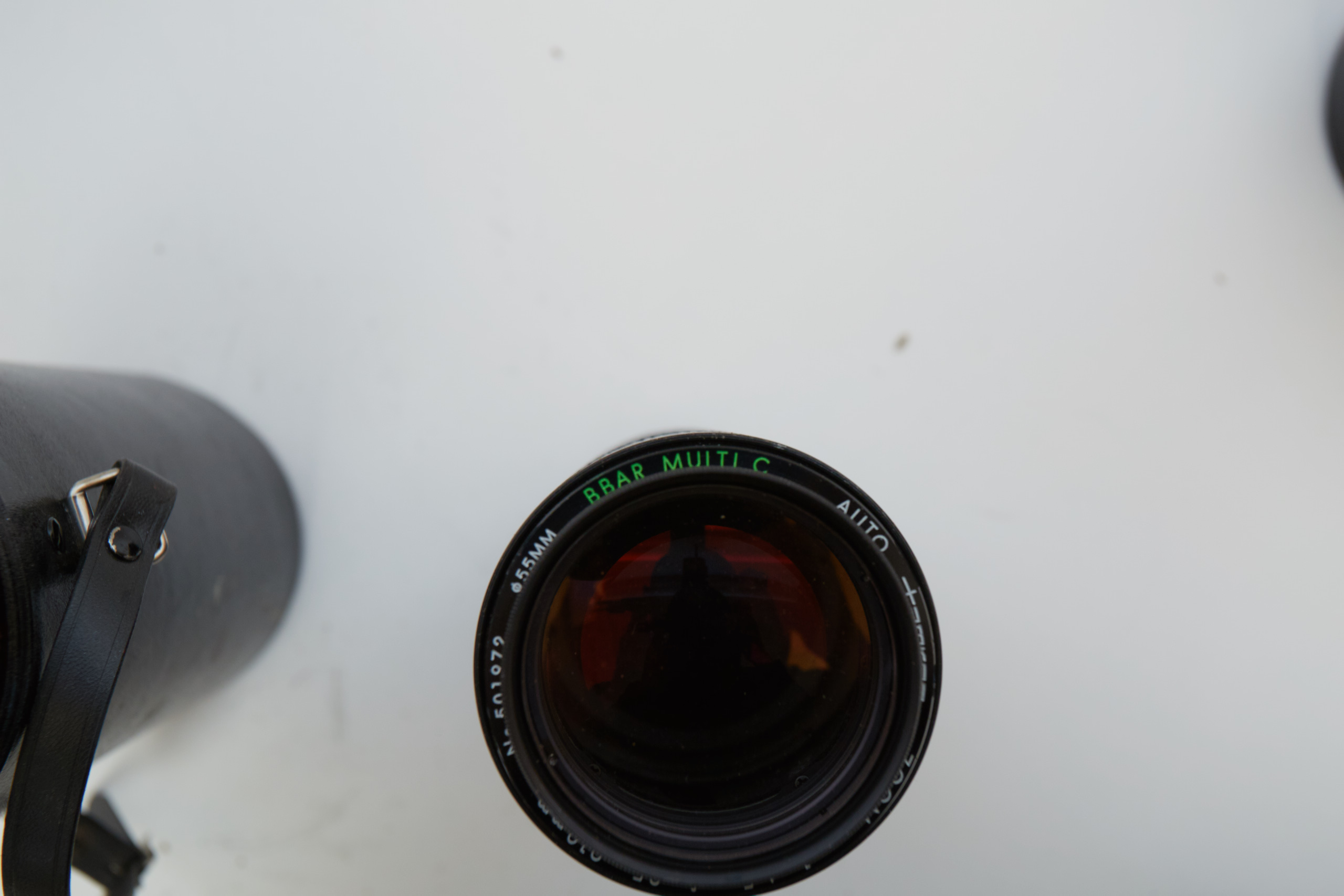 Vintage Olympus OM-1 SLR Camera with Three Lenses