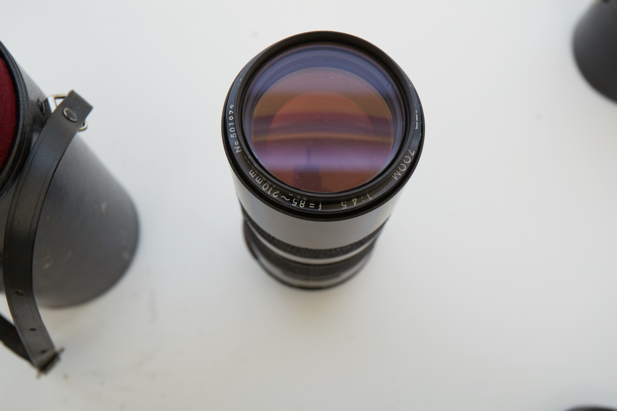 Vintage Olympus OM-1 SLR Camera with Three Lenses