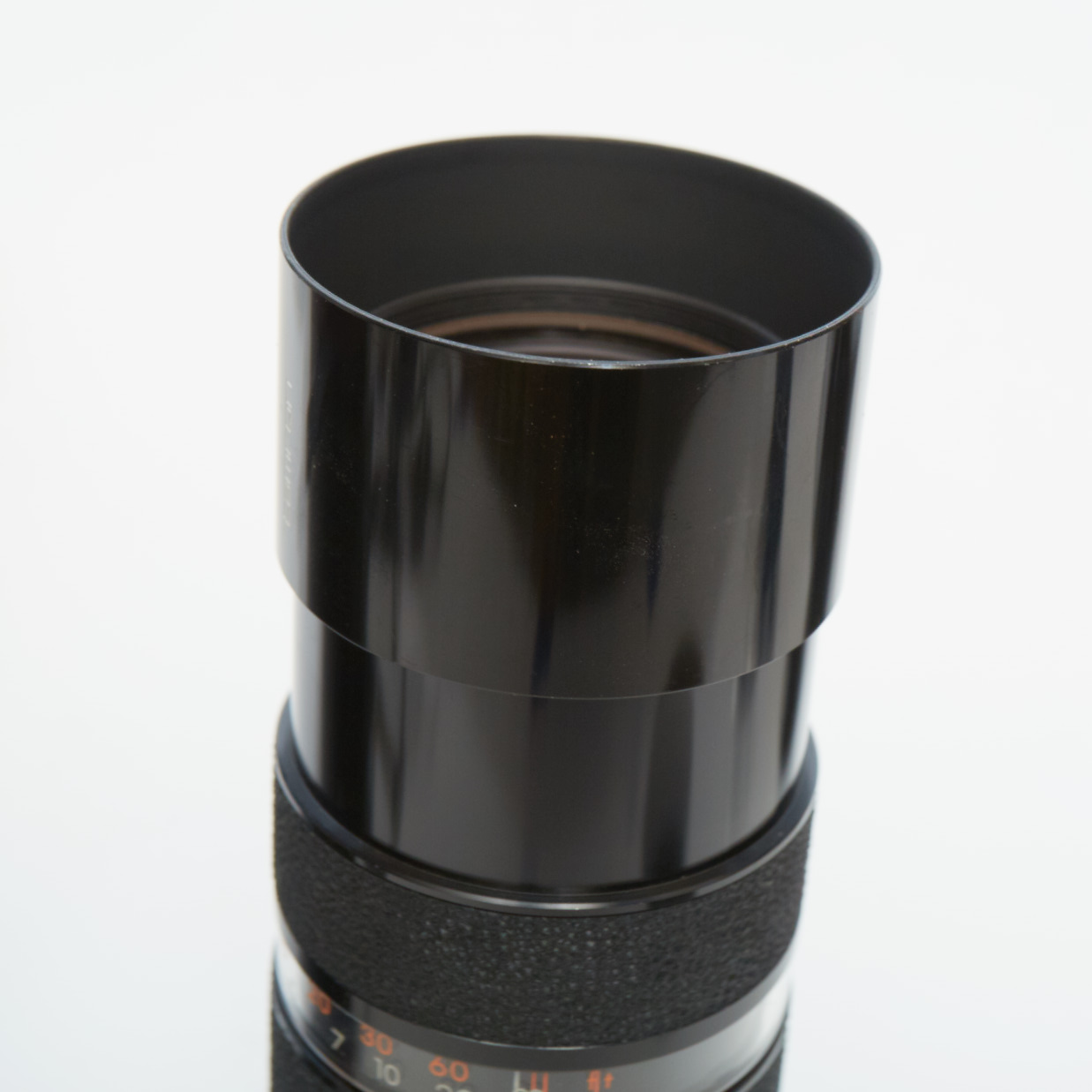 Vintage Olympus OM-1 SLR Camera with Three Lenses