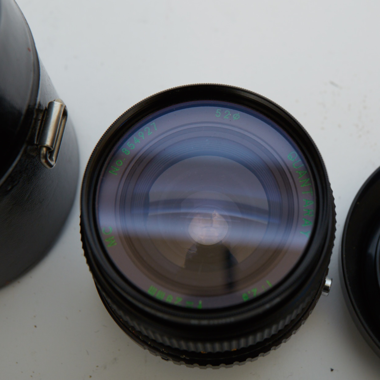 Vintage Olympus OM-1 SLR Camera with Three Lenses