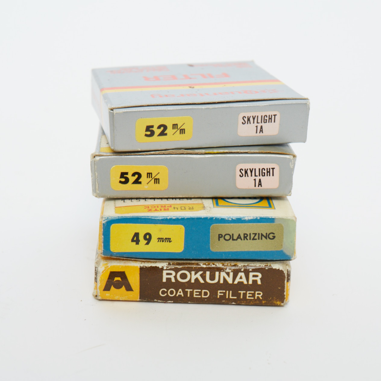 Vintage Olympus OM-1 SLR Camera with Three Lenses