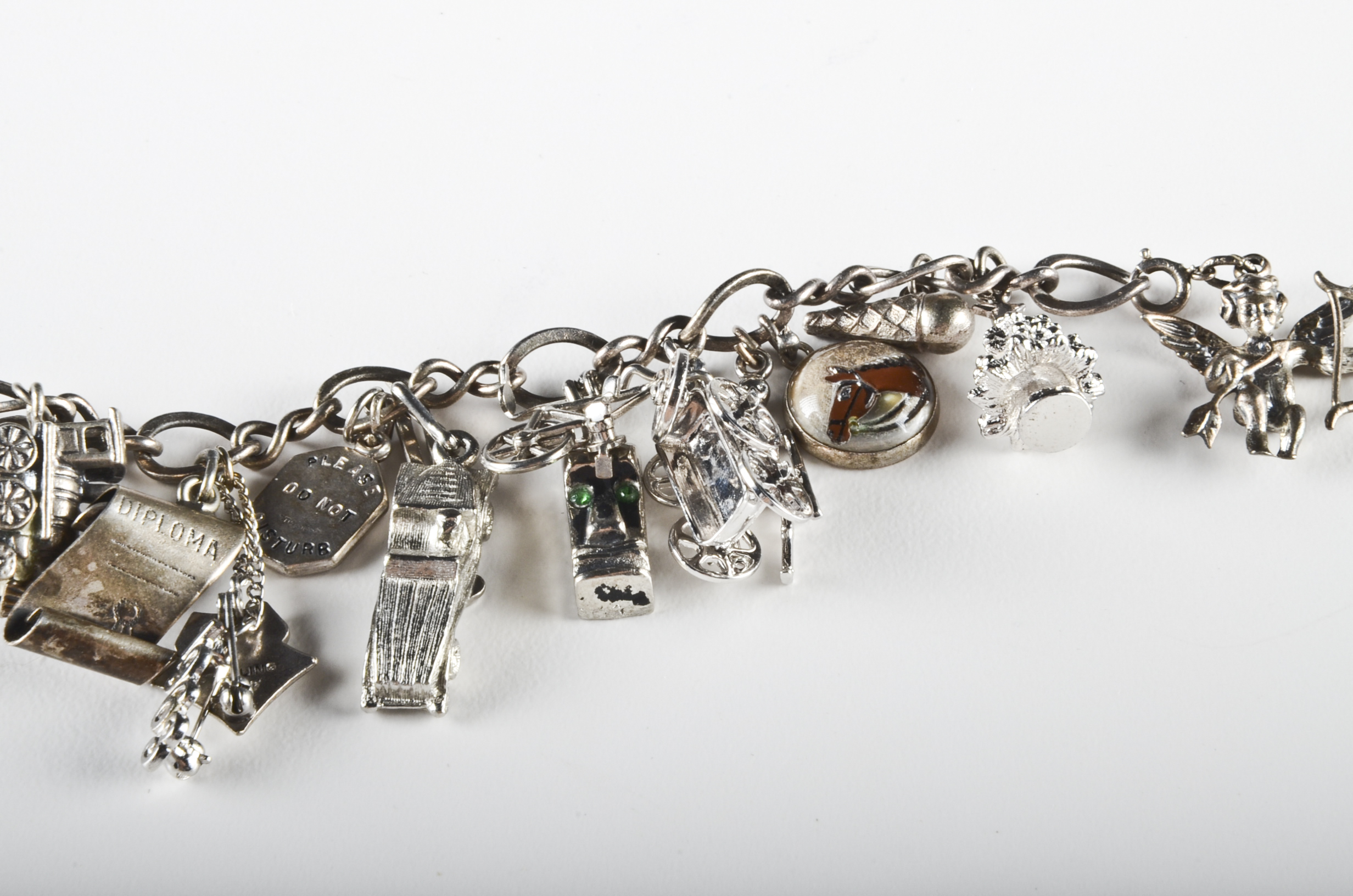 Sterling Charm Bracelet with Sterling and Silver Tone Charms