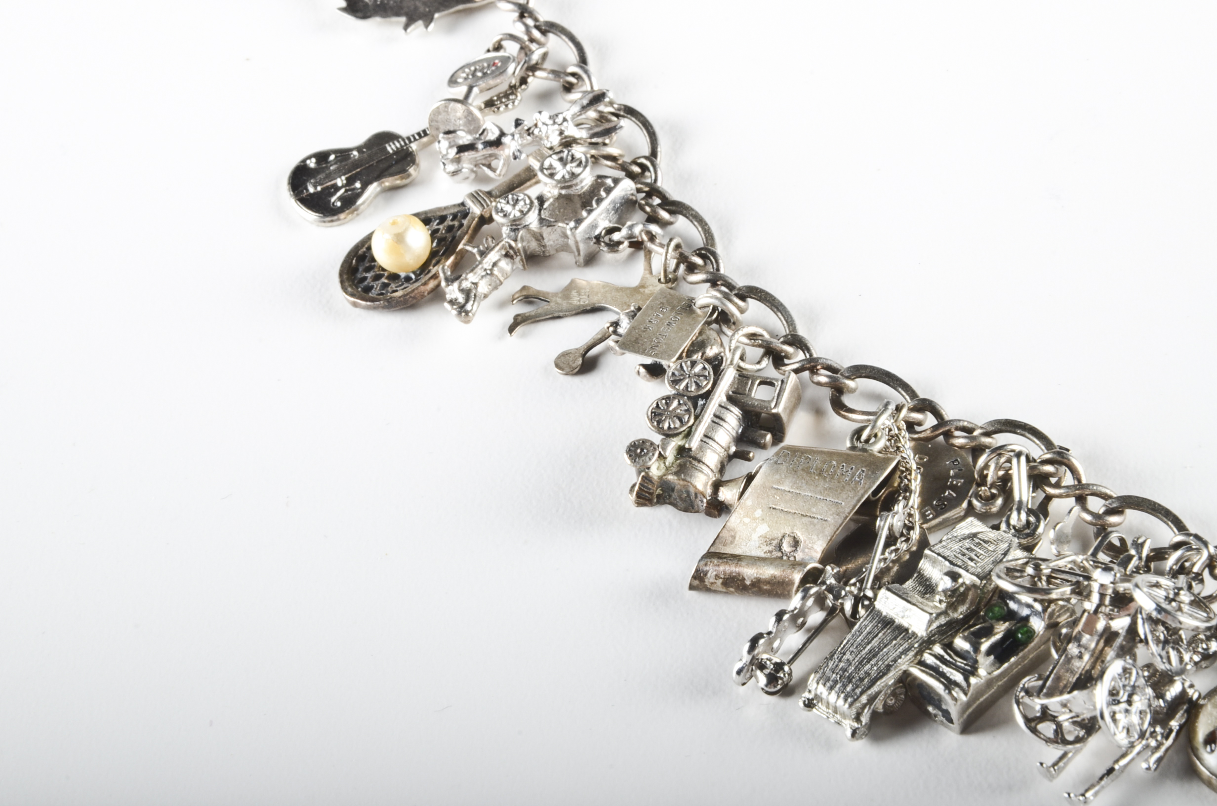Sterling Charm Bracelet with Sterling and Silver Tone Charms