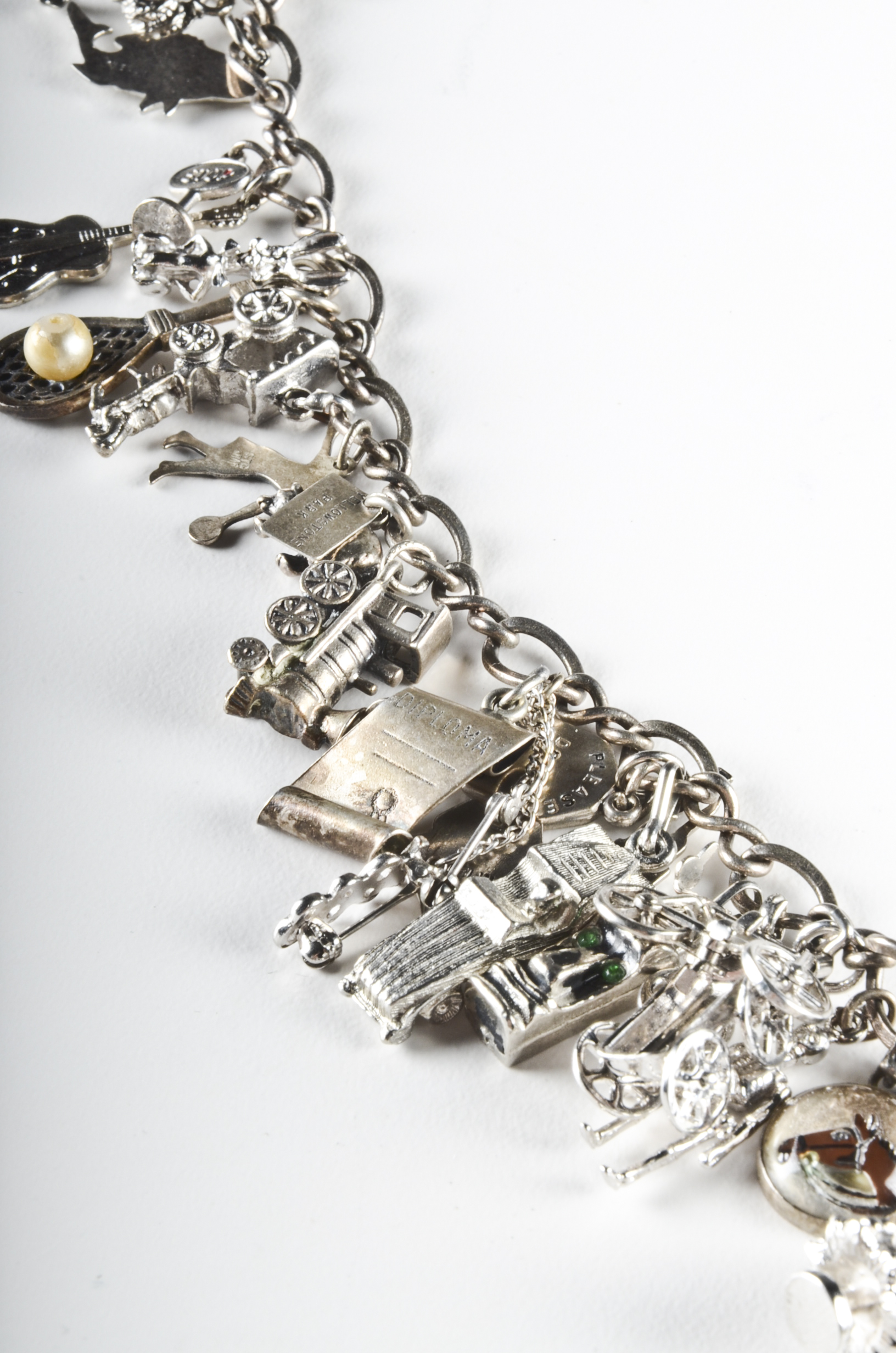 Sterling Charm Bracelet with Sterling and Silver Tone Charms