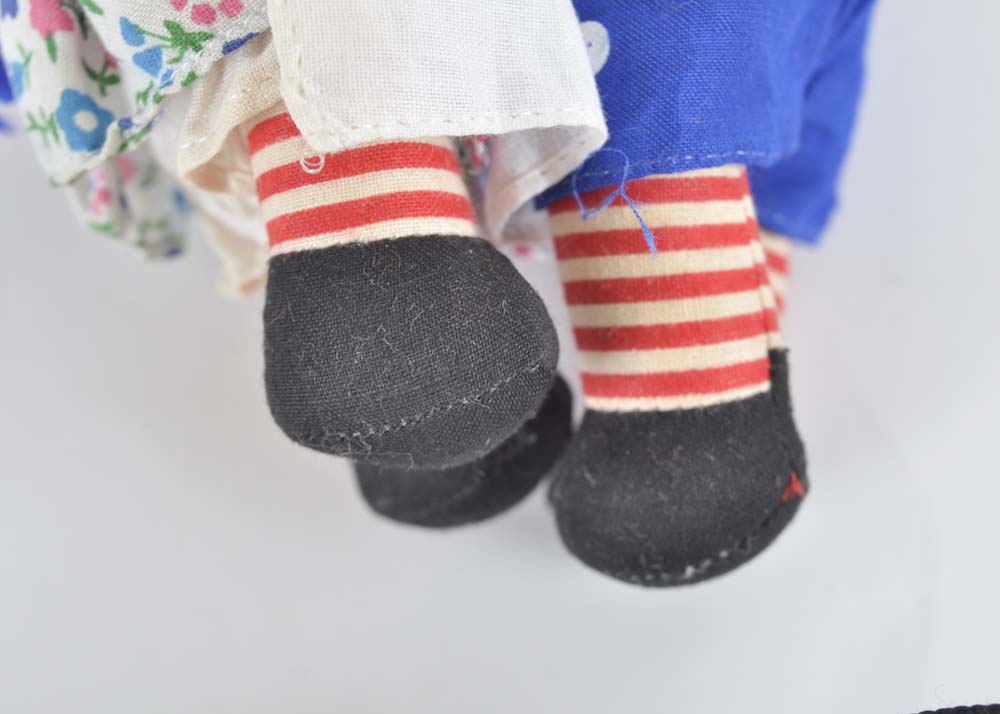 Embracing Raggedy Ann and Andy