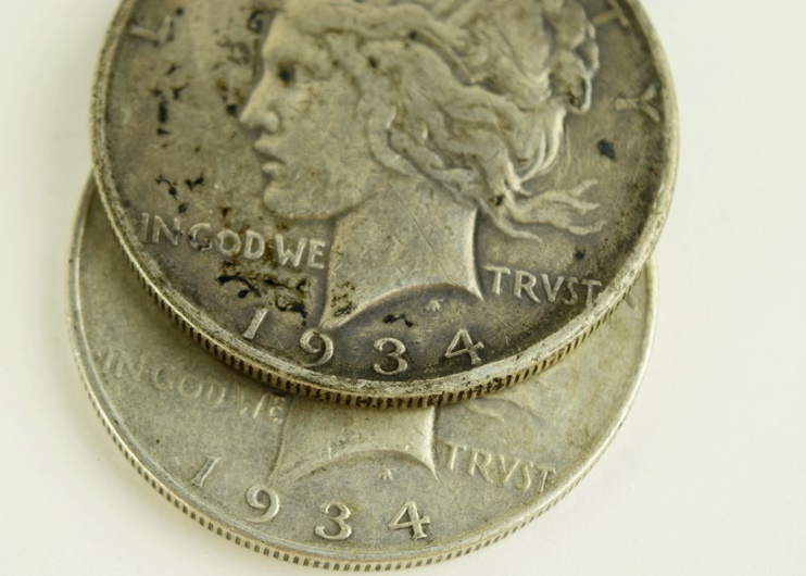 Twenty Seven US Peace Silver Dollars Dated 1922-1935