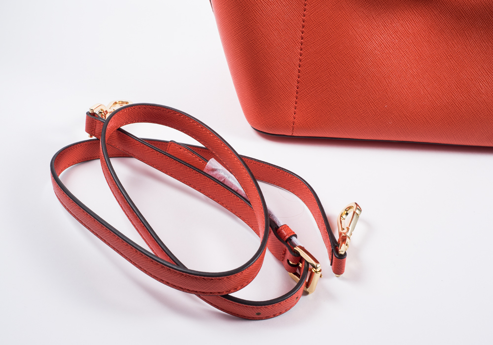 Michael Kors Orange Purse and Gold Wallet