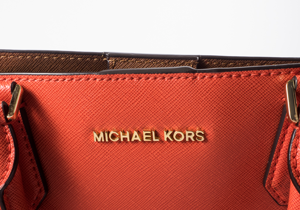 Michael Kors Orange Purse and Gold Wallet