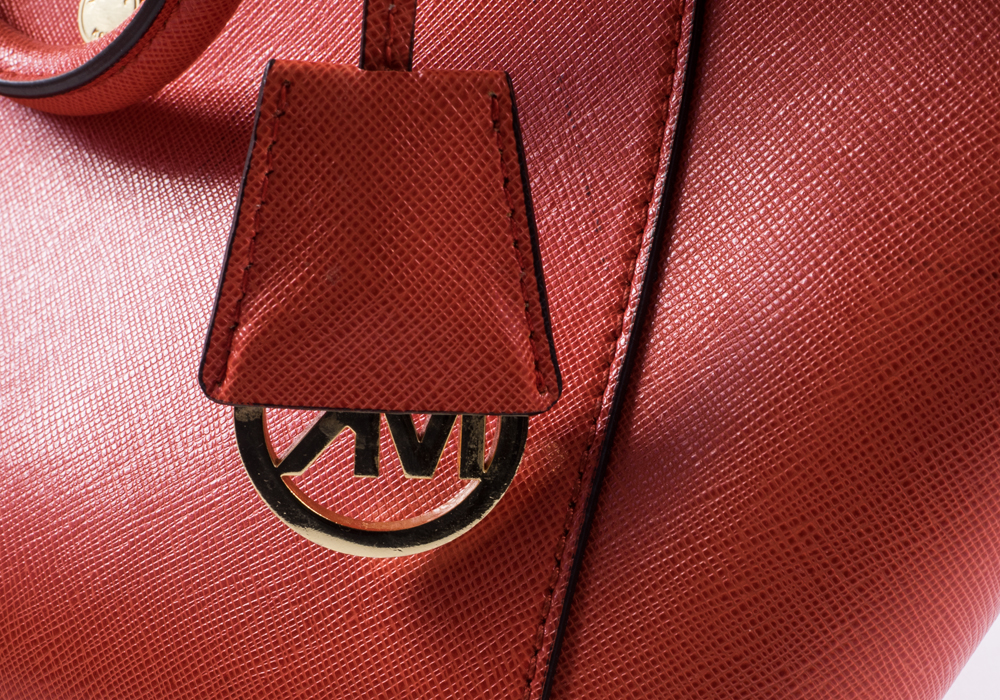 Michael Kors Orange Purse and Gold Wallet