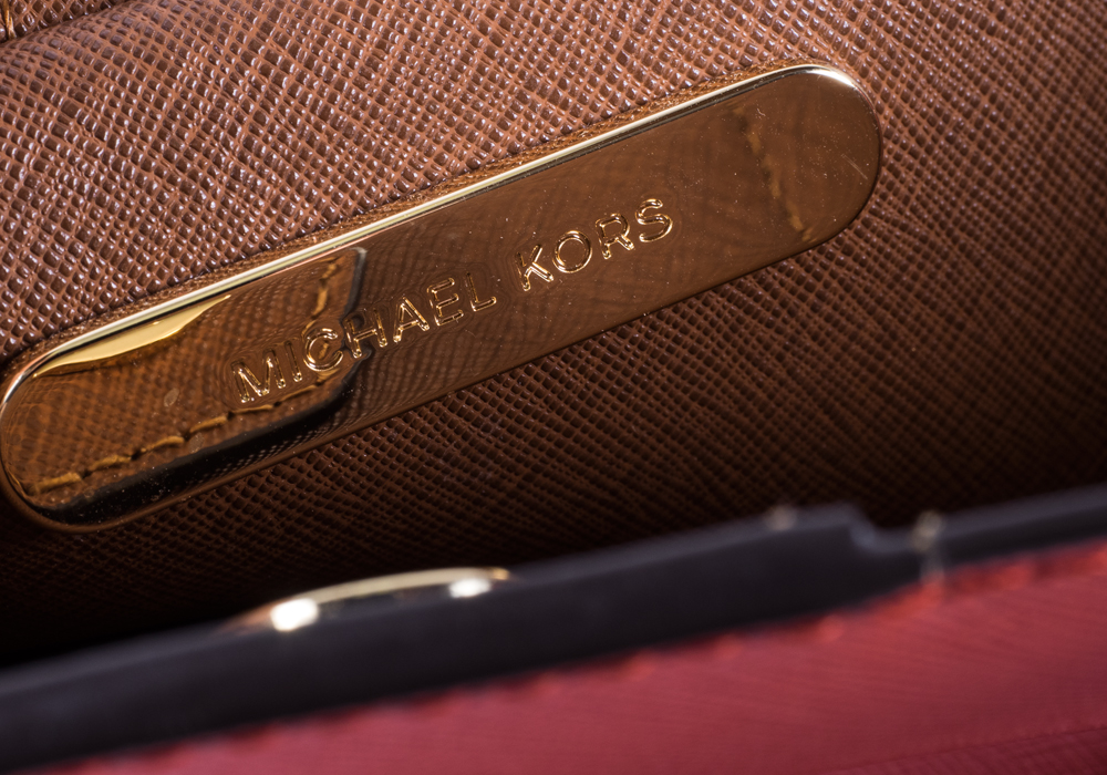 Michael Kors Orange Purse and Gold Wallet