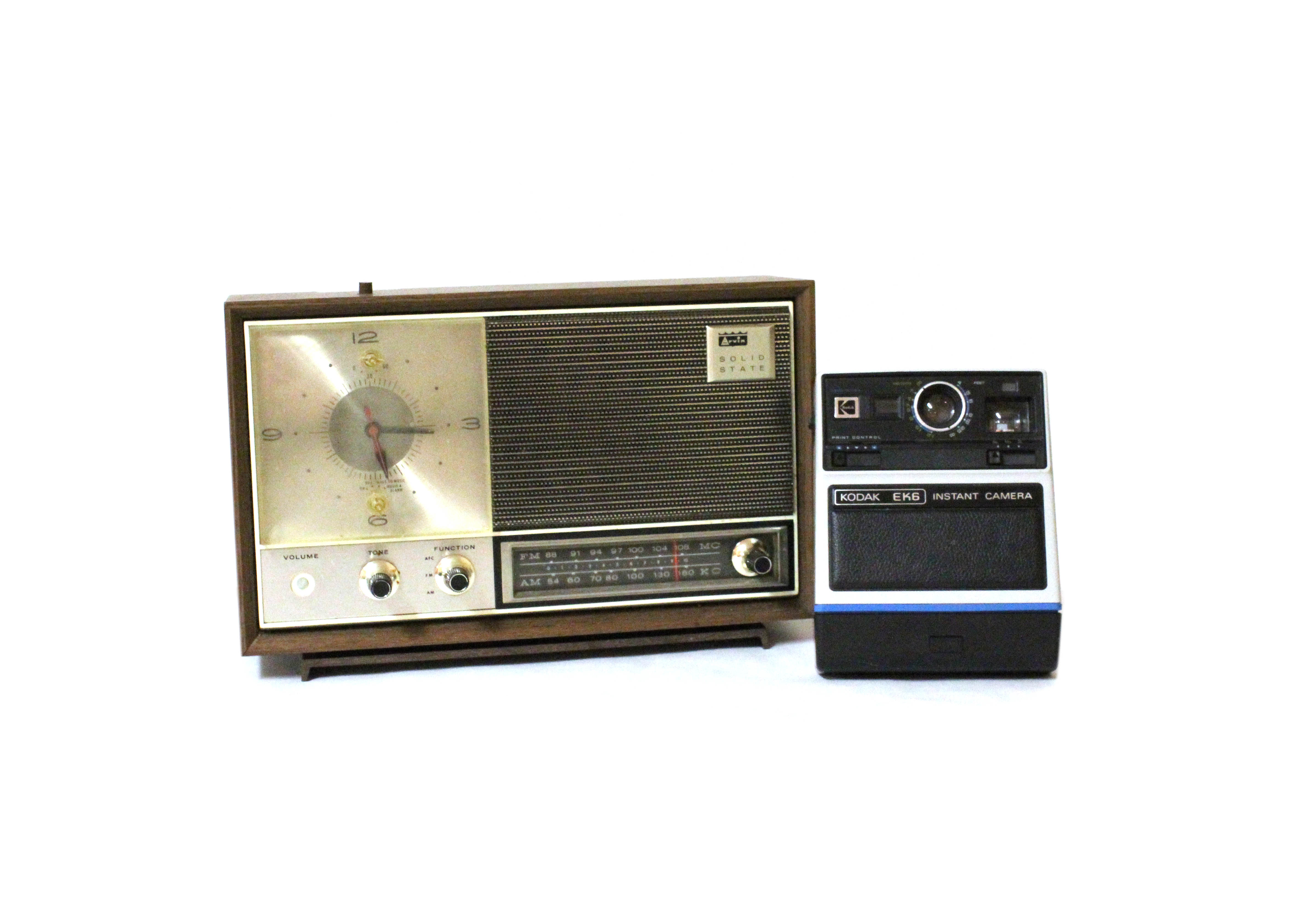 Vintage Arvin Solid State Clock Radio and Kodak Instant Camera