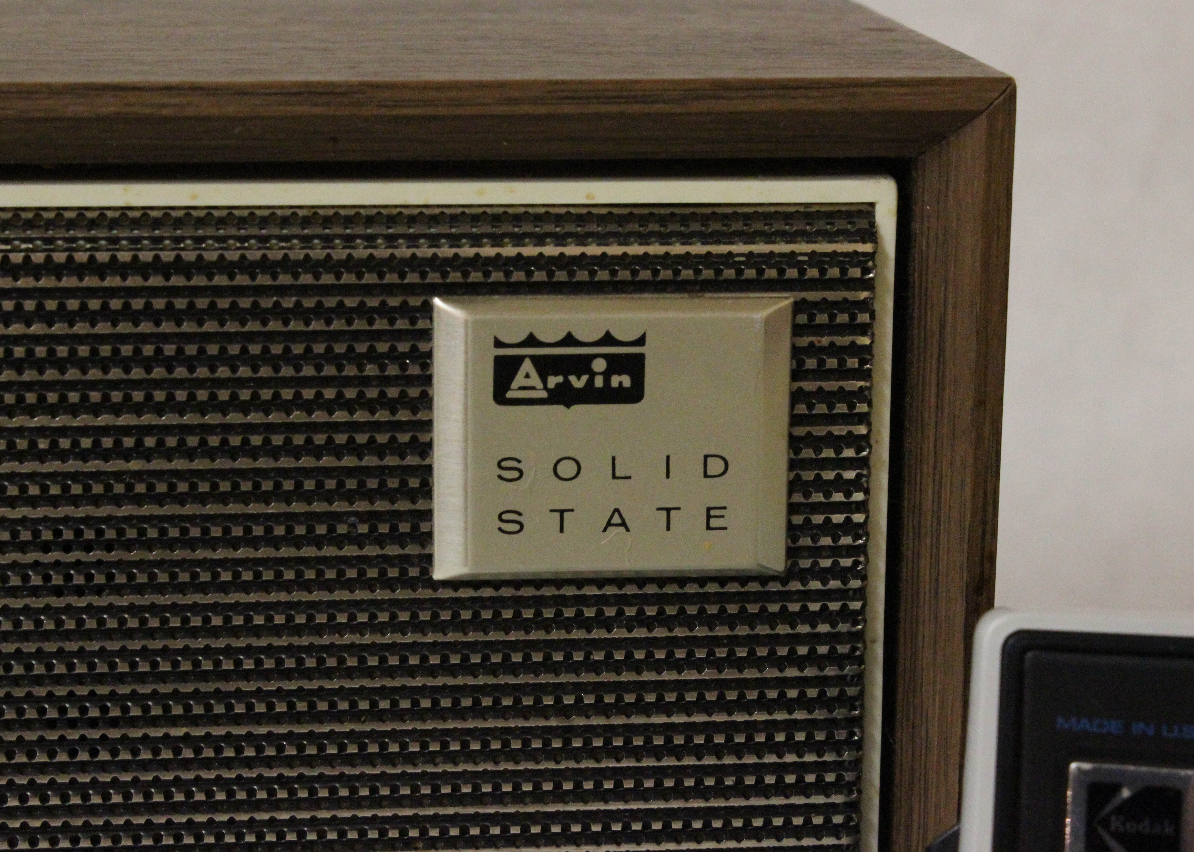 Vintage Arvin Solid State Clock Radio and Kodak Instant Camera