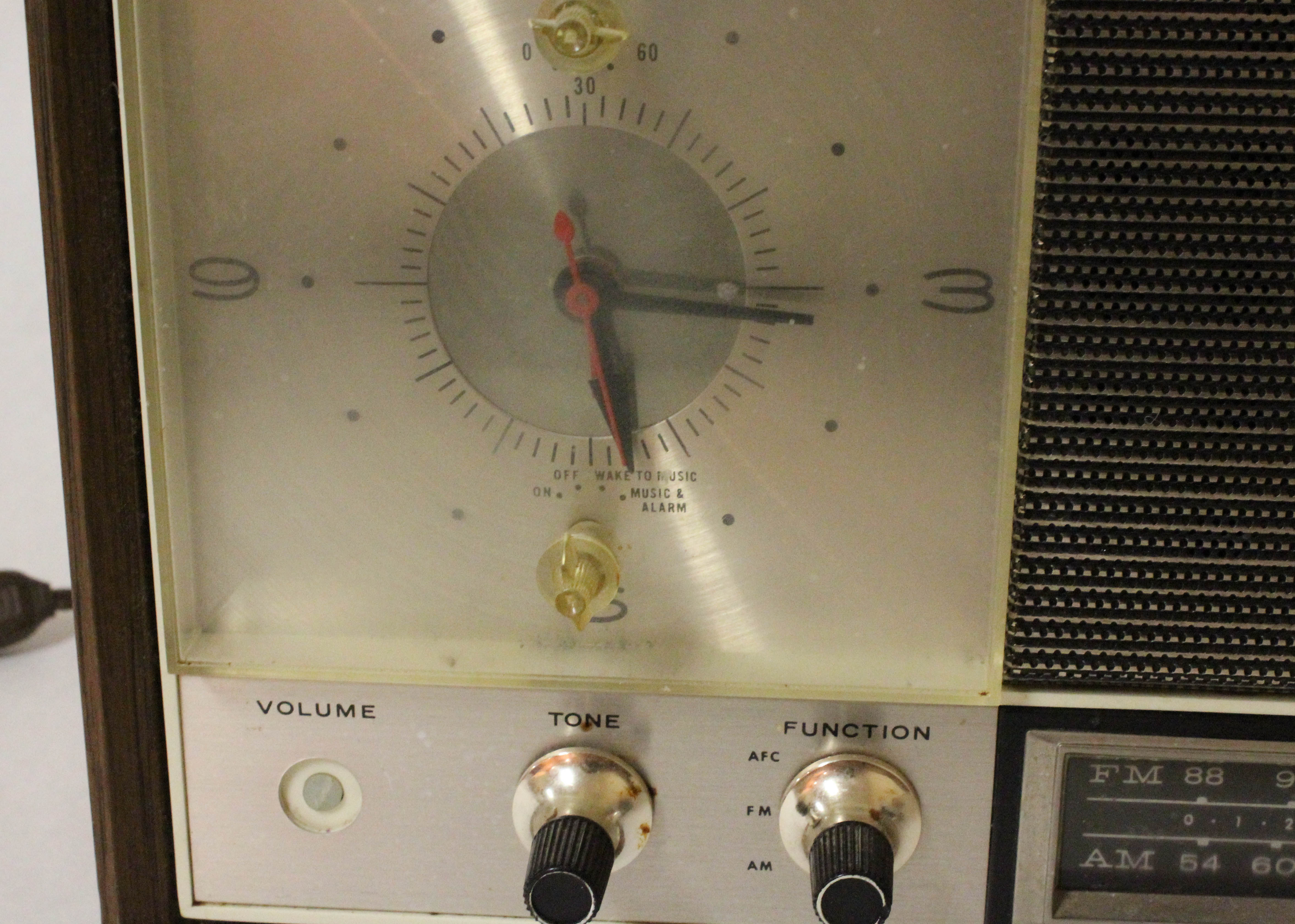 Vintage Arvin Solid State Clock Radio and Kodak Instant Camera