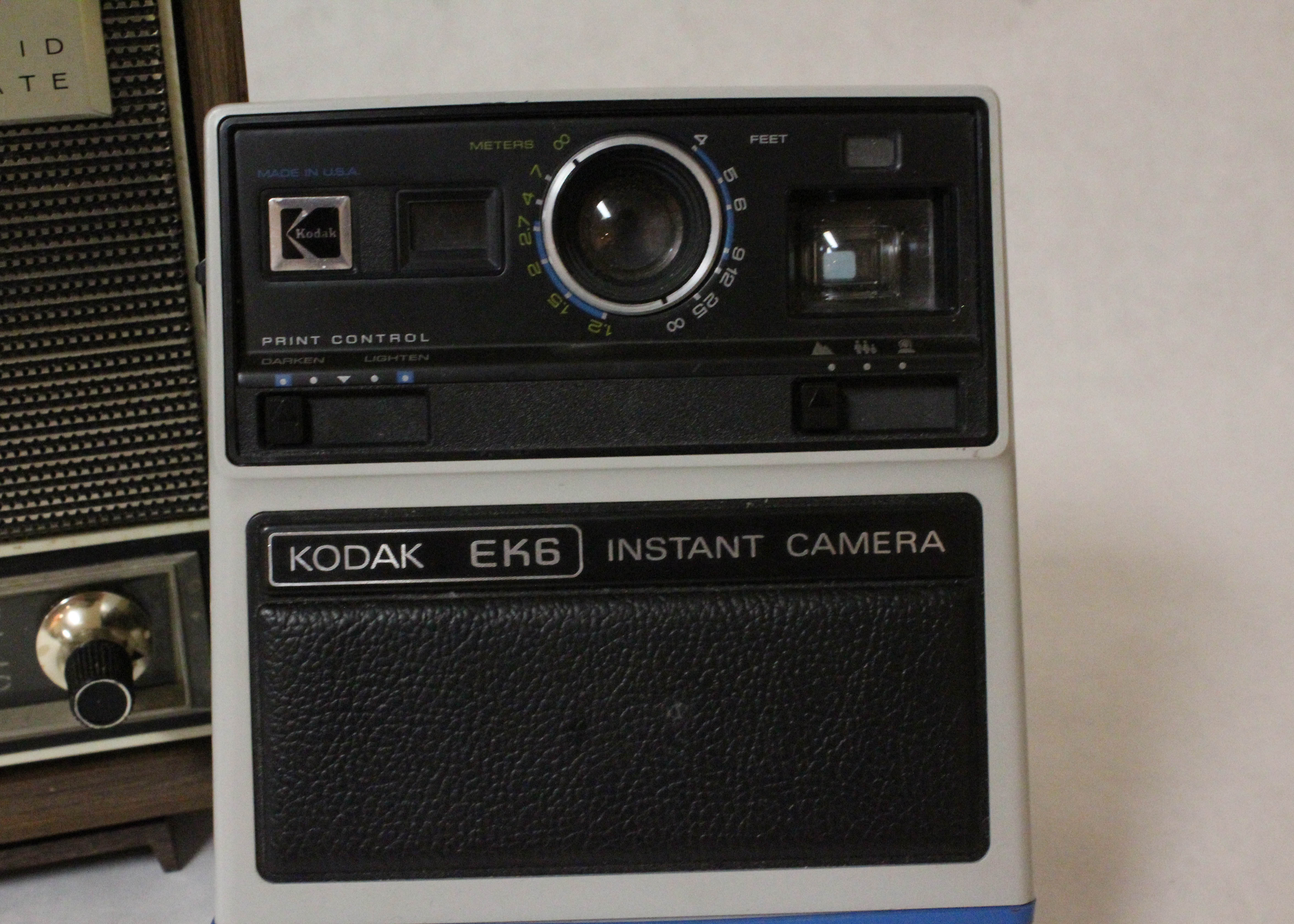Vintage Arvin Solid State Clock Radio and Kodak Instant Camera