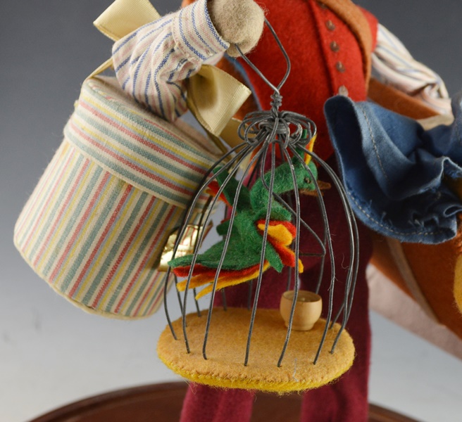 Cloth Traveler Figurine Under A Glass Cloche
