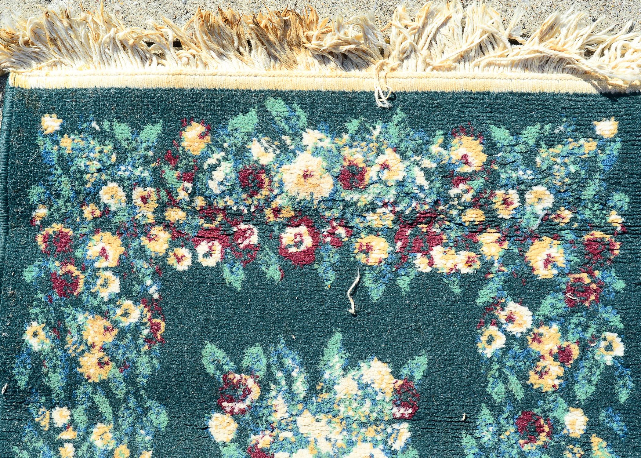 Pair of Small Floral Rugs