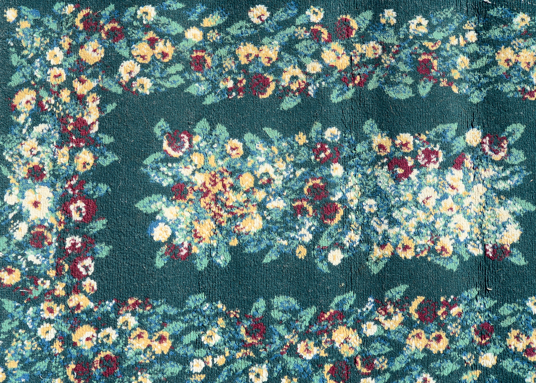 Pair of Small Floral Rugs