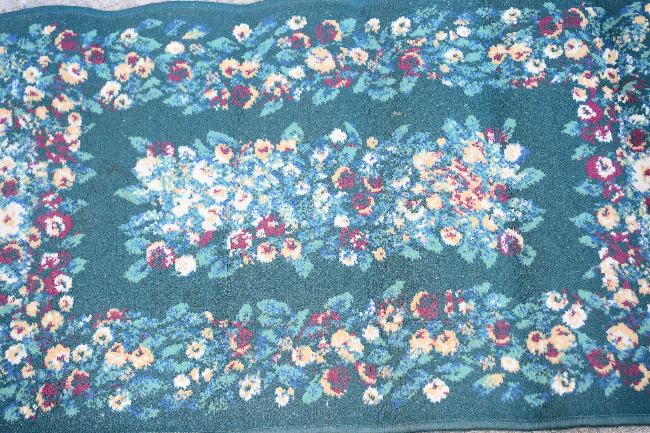 Pair of Small Floral Rugs