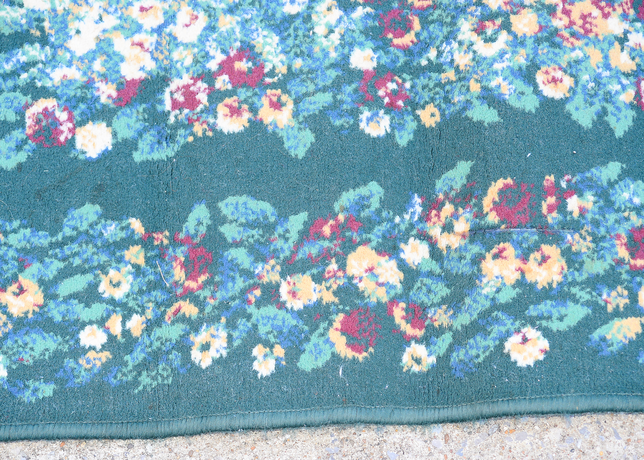 Pair of Small Floral Rugs