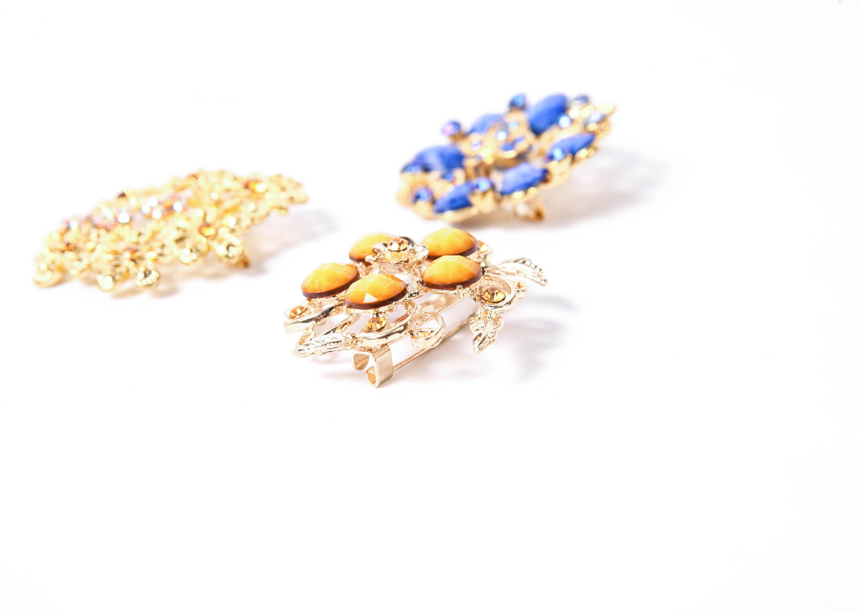 Trio of Vintage Gold-Tone Brooches