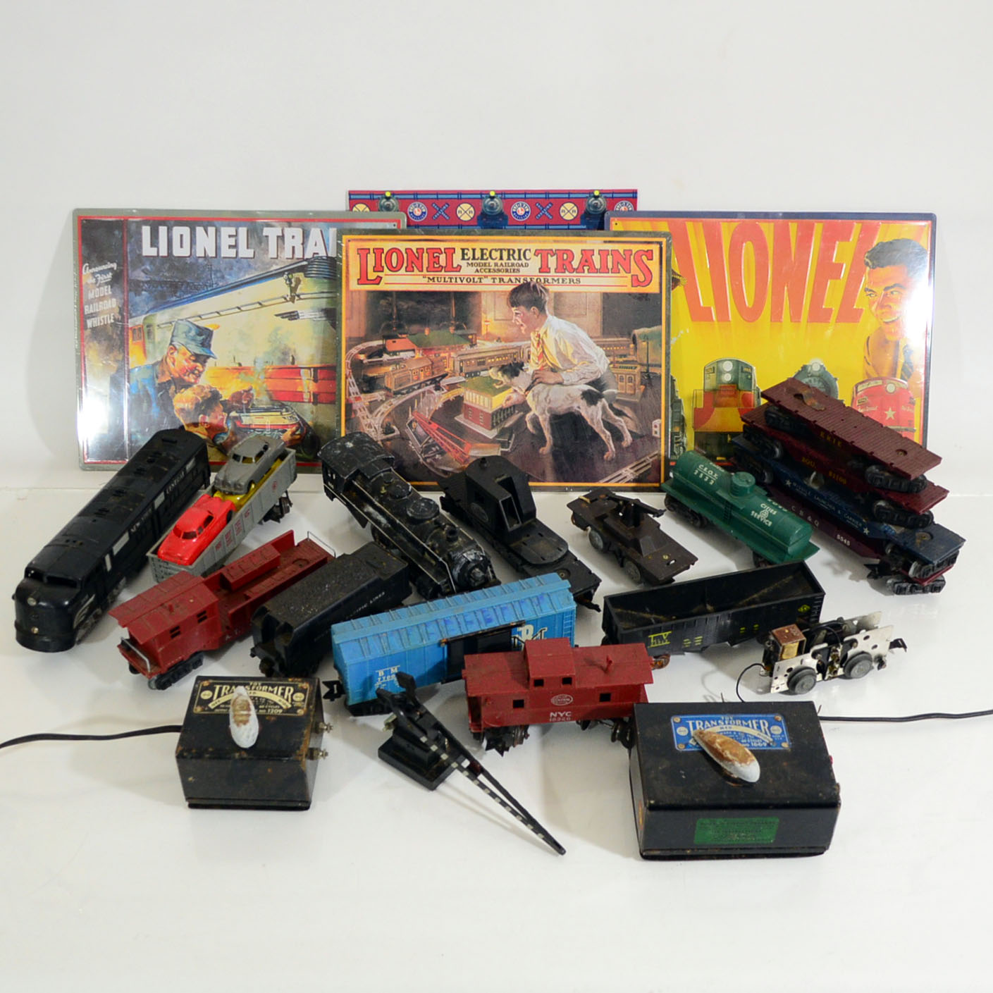 Vintage Marx Model Trains, Transformers, And Lionel Tin Signs
