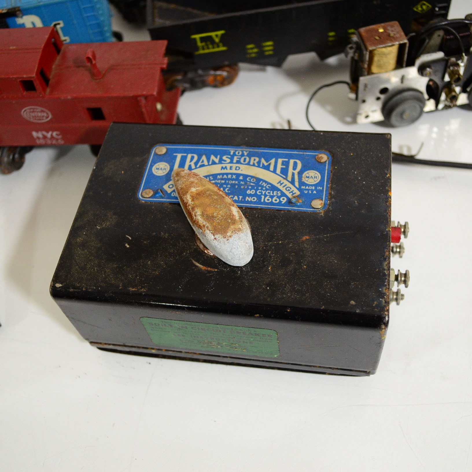 Vintage Marx Model Trains, Transformers, And Lionel Tin Signs