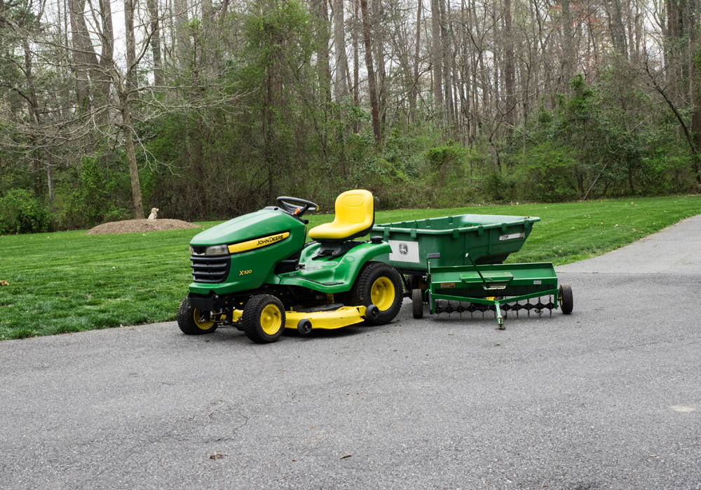 John Deere x320 Tractor with Attachments