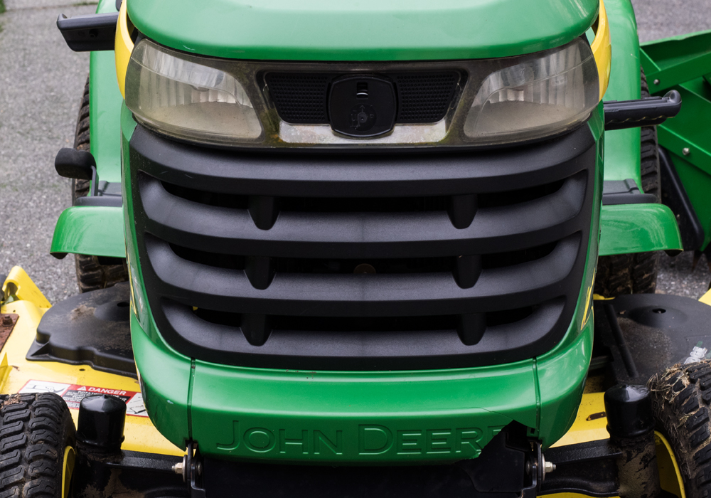 John Deere x320 Tractor with Attachments