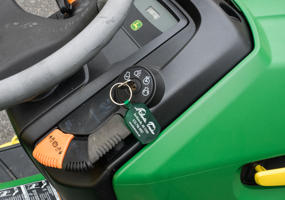 John Deere x320 Tractor with Attachments