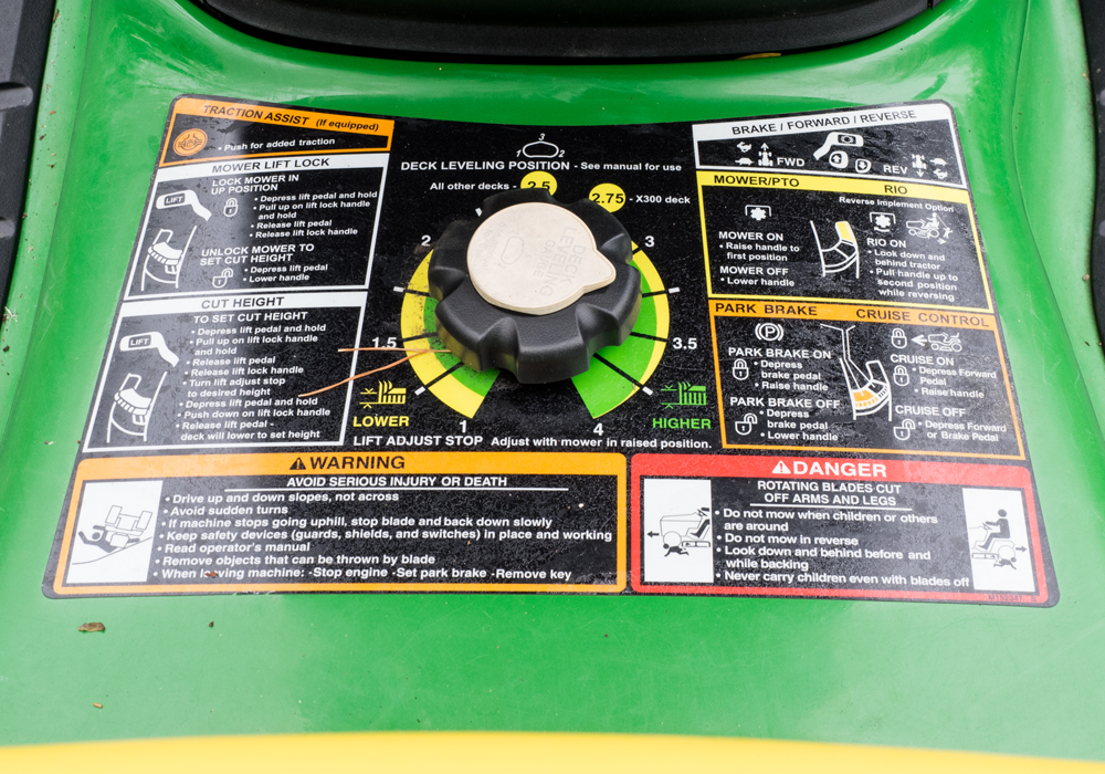 John Deere x320 Tractor with Attachments